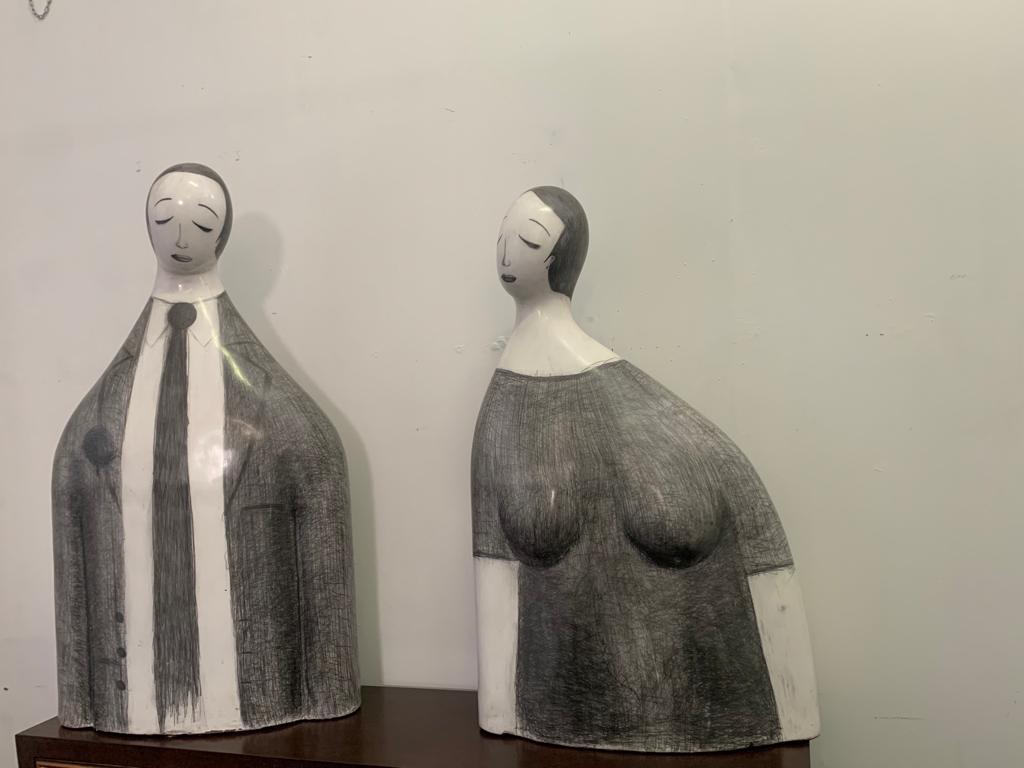 Thought of Love: a pair of glazed terracotta and graphite sculptures made by Yuri Zatarain in 2005. They are individual and potentially independent figures, but only when placed next to each other the love message they carry emerge strongly. On the