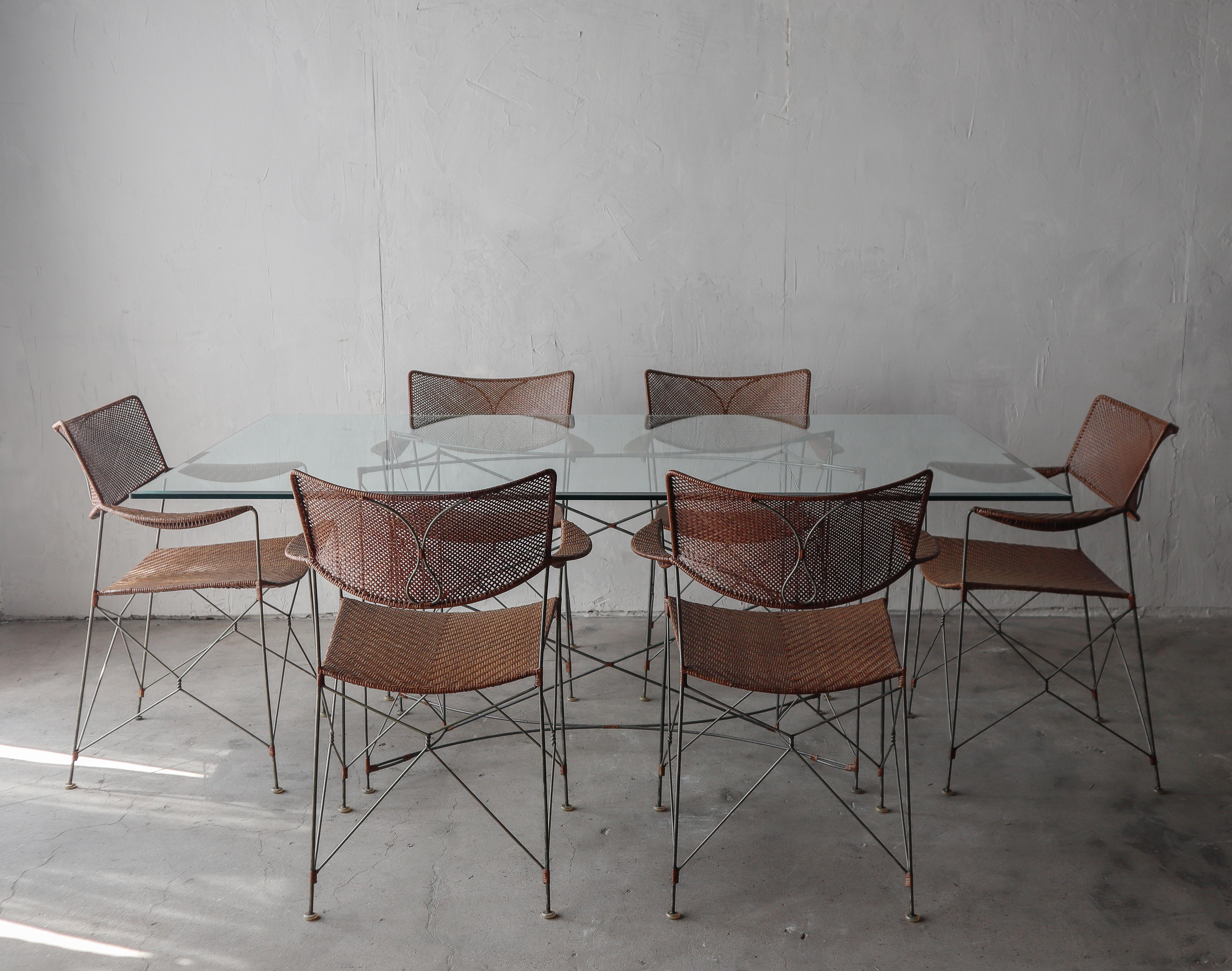 Find another, we dare.

Super rare find, this stunning Yuzuru Yamakawa, Rattan and Steel wire dining set, complete with dining table and 6 chairs. The details on this set is incredible.

This set was built to last, with integrity and quality and