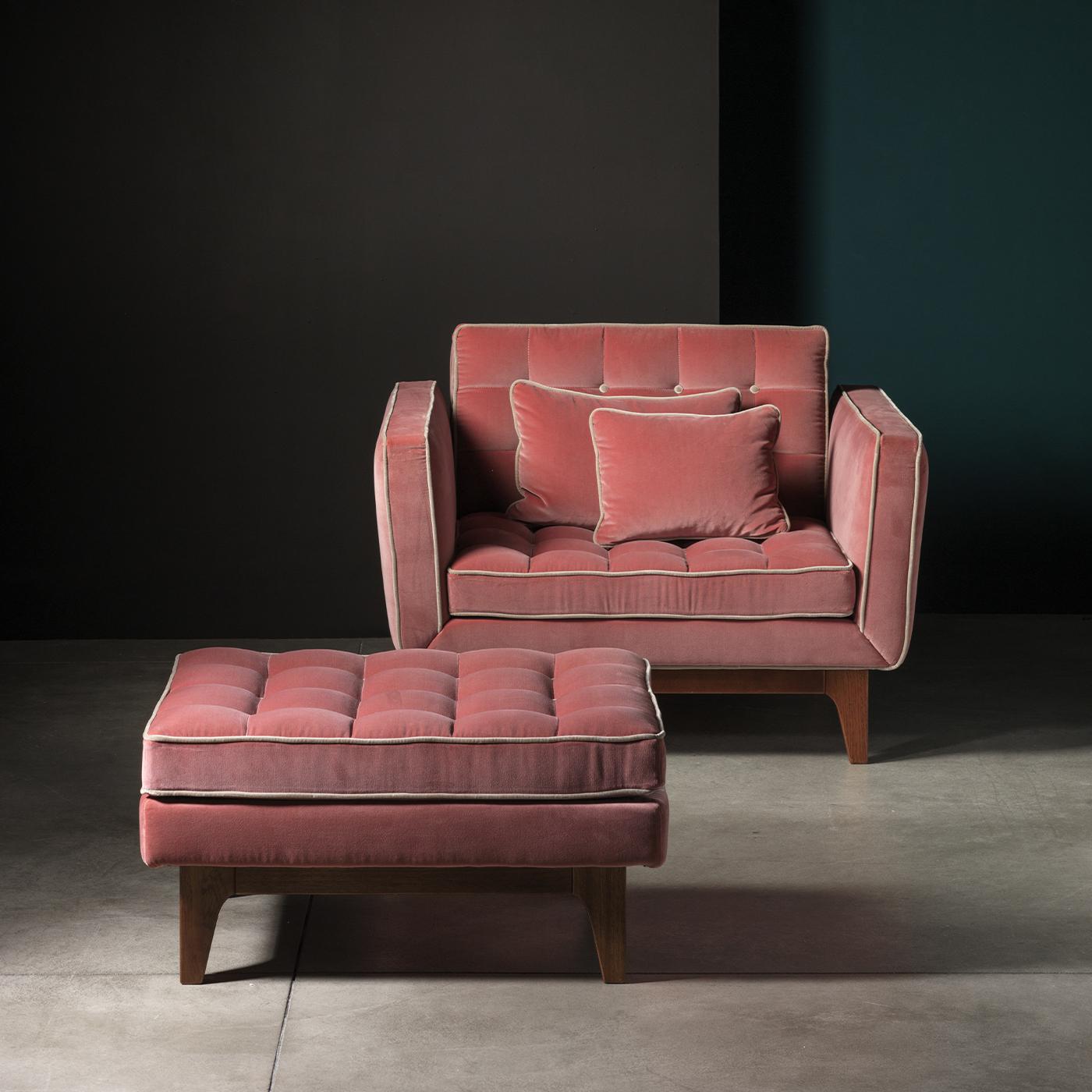 The Yvan Pouffe pairs a mid-century-style solid mahogany base with rich red velvet upholstery. Contrast piping and button-tufted quilting nod to traditional interior style codes, exuding a romantic allure to create a warm ambiance. Comfortable,