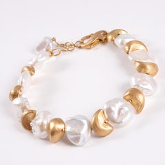 Yvel 18 Karat Gold and Pearl Bracelet