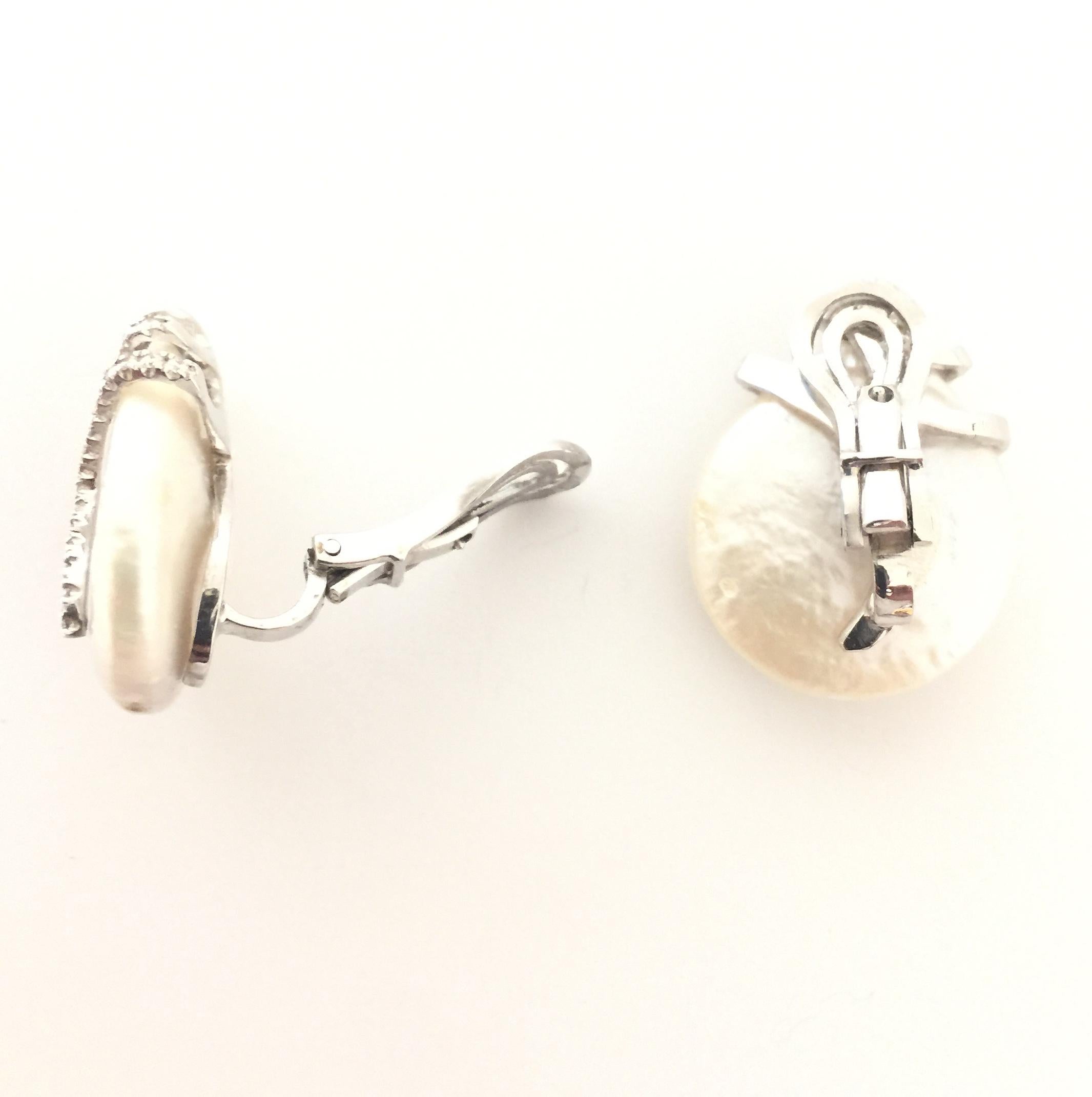 Yvel Pearls And Diamonds Earring.
18k White Gold 
Pearls 
Diamonds 0..60ctw
Clip on Earring
E295FLLW