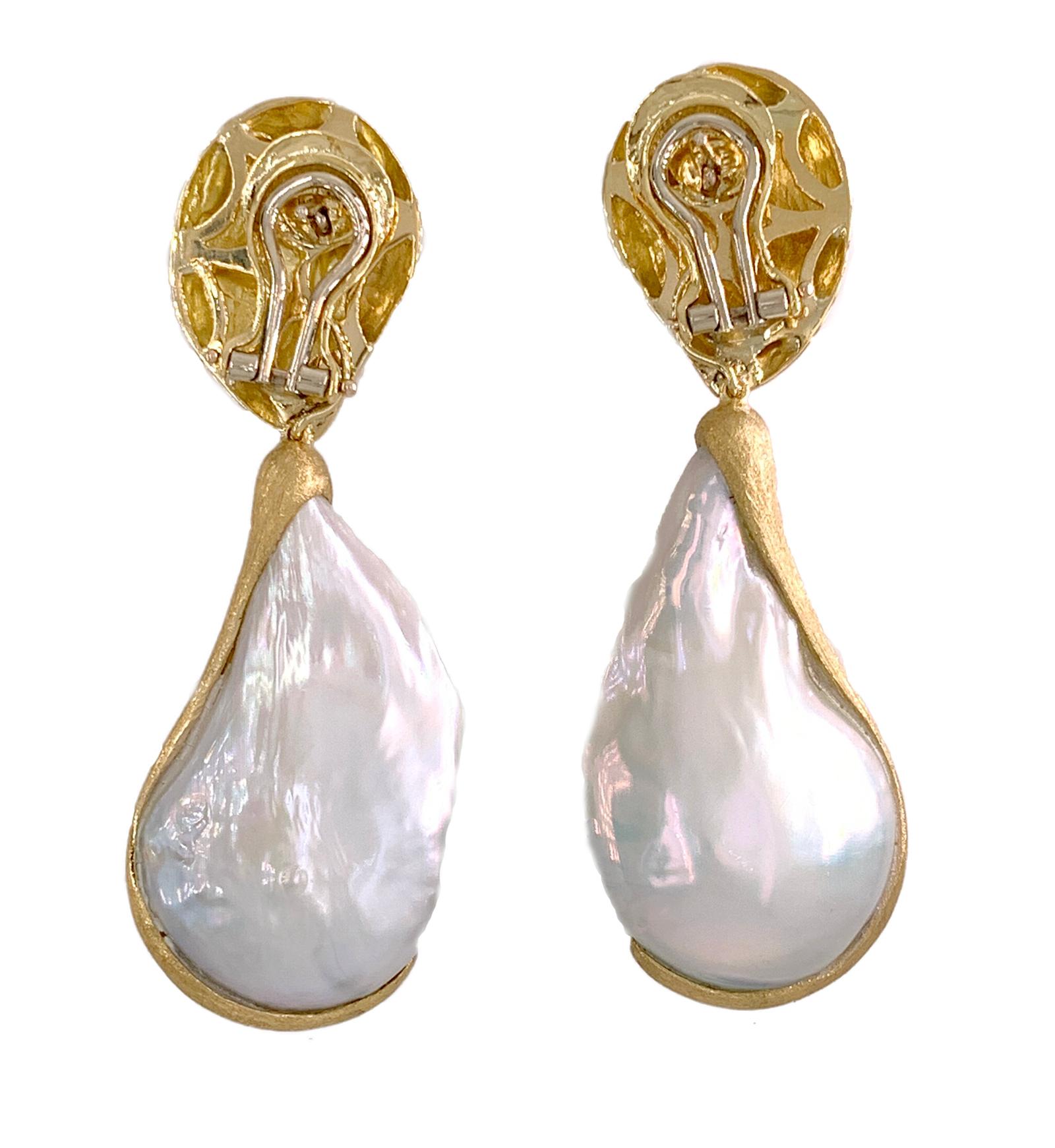 Yvel's signature, handmade 18k yellow Gold, Satin-finish Earrings feature removable Pearl Drops
SIgnificant, Large Baroque Pearls are approximately 44mm x 26mm.
Post backs with French clips.
Stamped 750, and YVEL hallmark