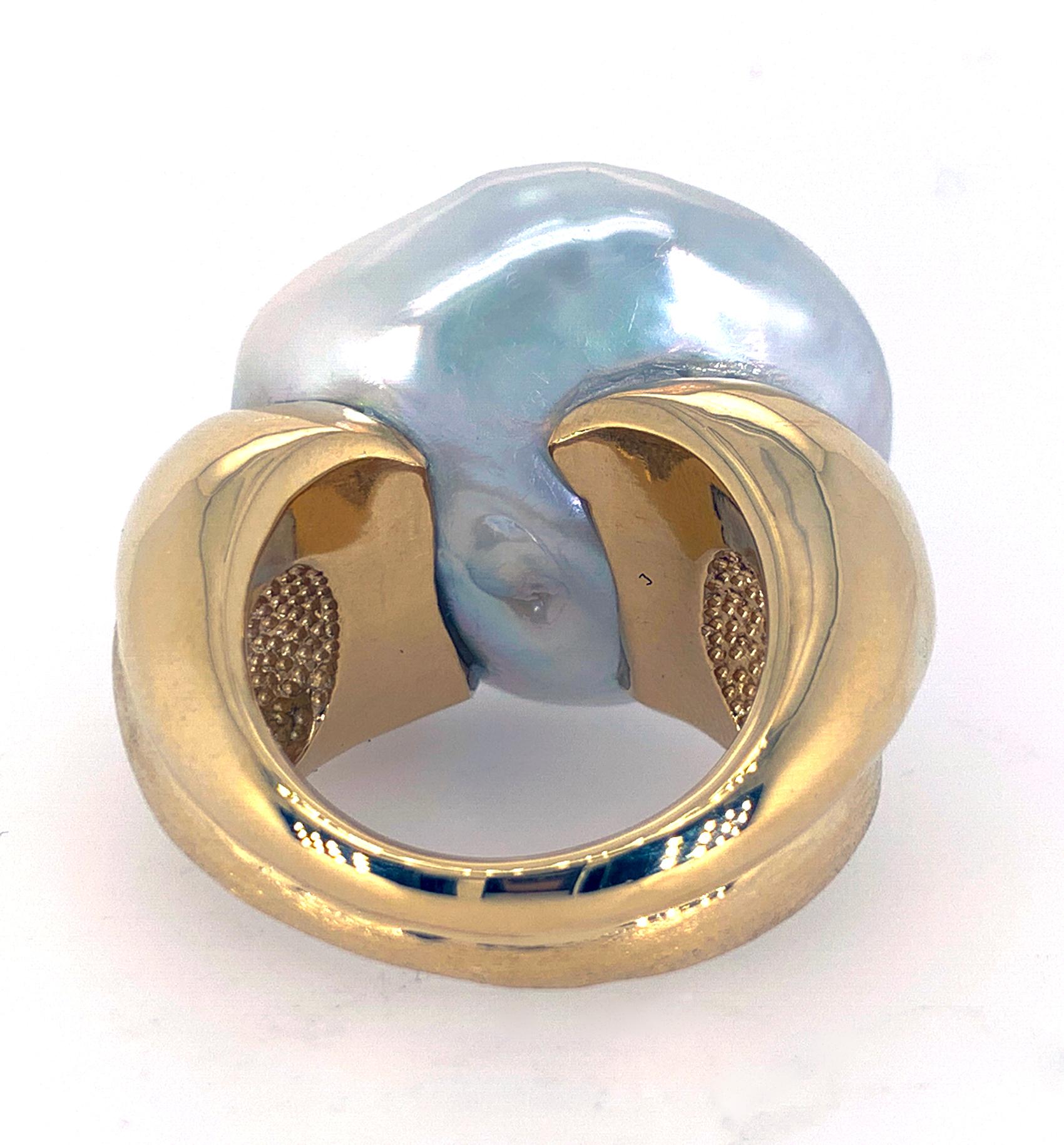 Yvel's signature, handmade 18k yellow Gold, Satin-finish is combined with high polish gold in this large Pearl Ring.  Large Baroque Pearl is approximately 27mm x 29mm.
Size 10 1/2
Stamped 750, and YVEL hallmark