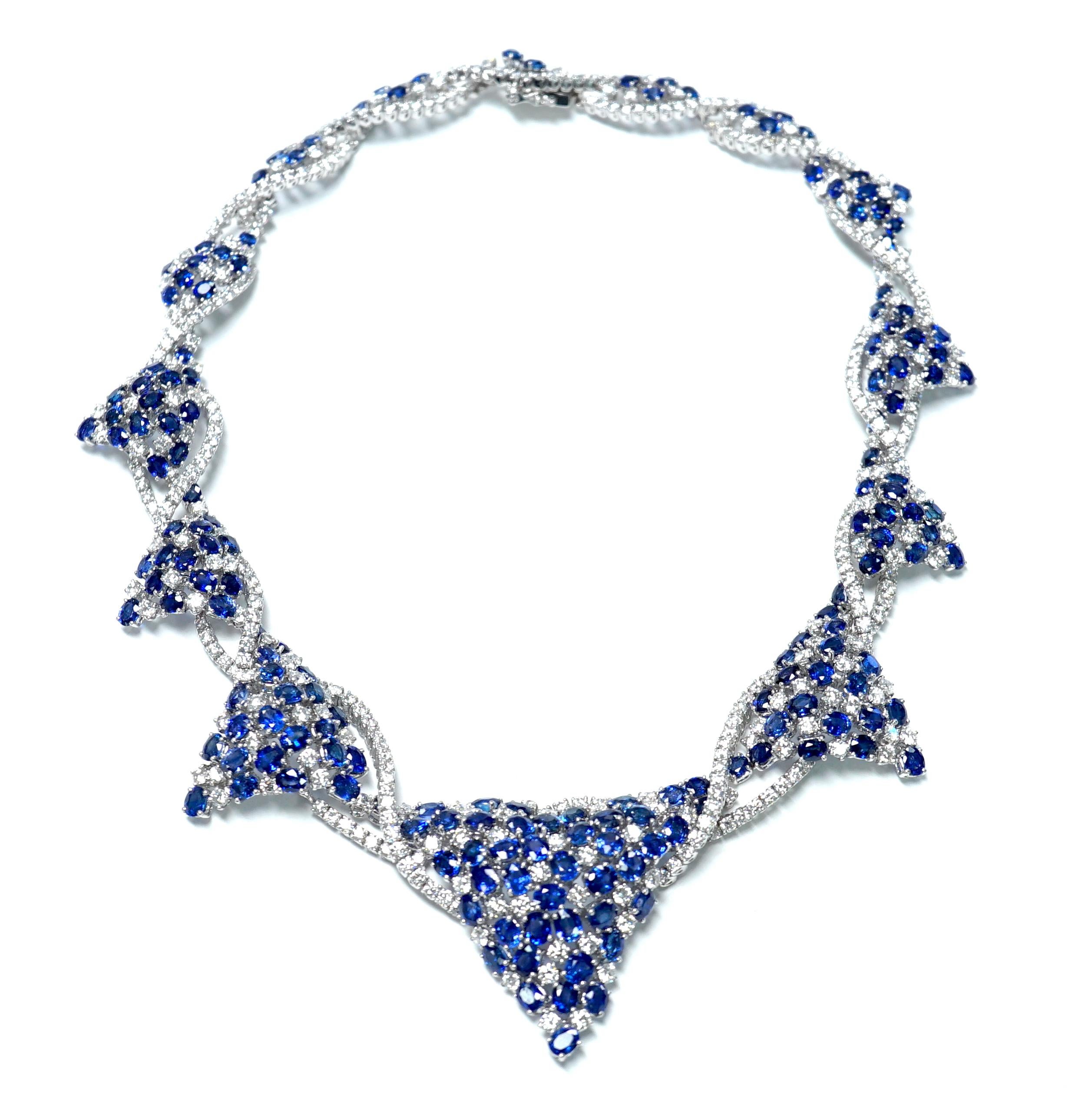 For the lover of classic, timeless jewelry!  This 18 karat white gold and diamond stunner is just the answer!  Composed of 28.48 carats of diamonds, along with 69.65 carats of bright blue sapphires, this necklace would compliment any outfit!
The