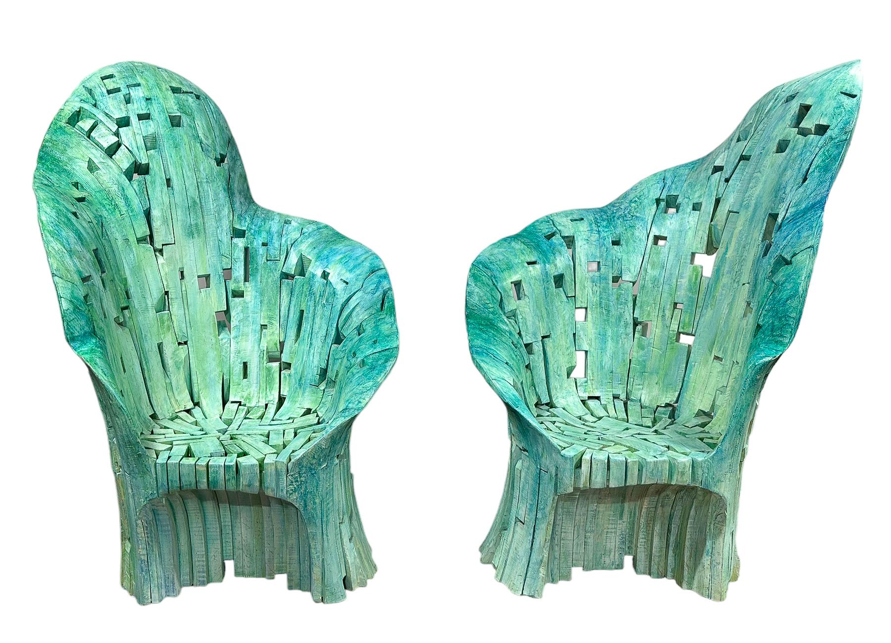 Whimsical and fun Yves Boucard high back chairs. Dramatic freeform chairs are constructed of wood and hand-painted. 

Yves Boucard (Swiss, b. 1953)

H 60 x W 43 x D 36 inches.