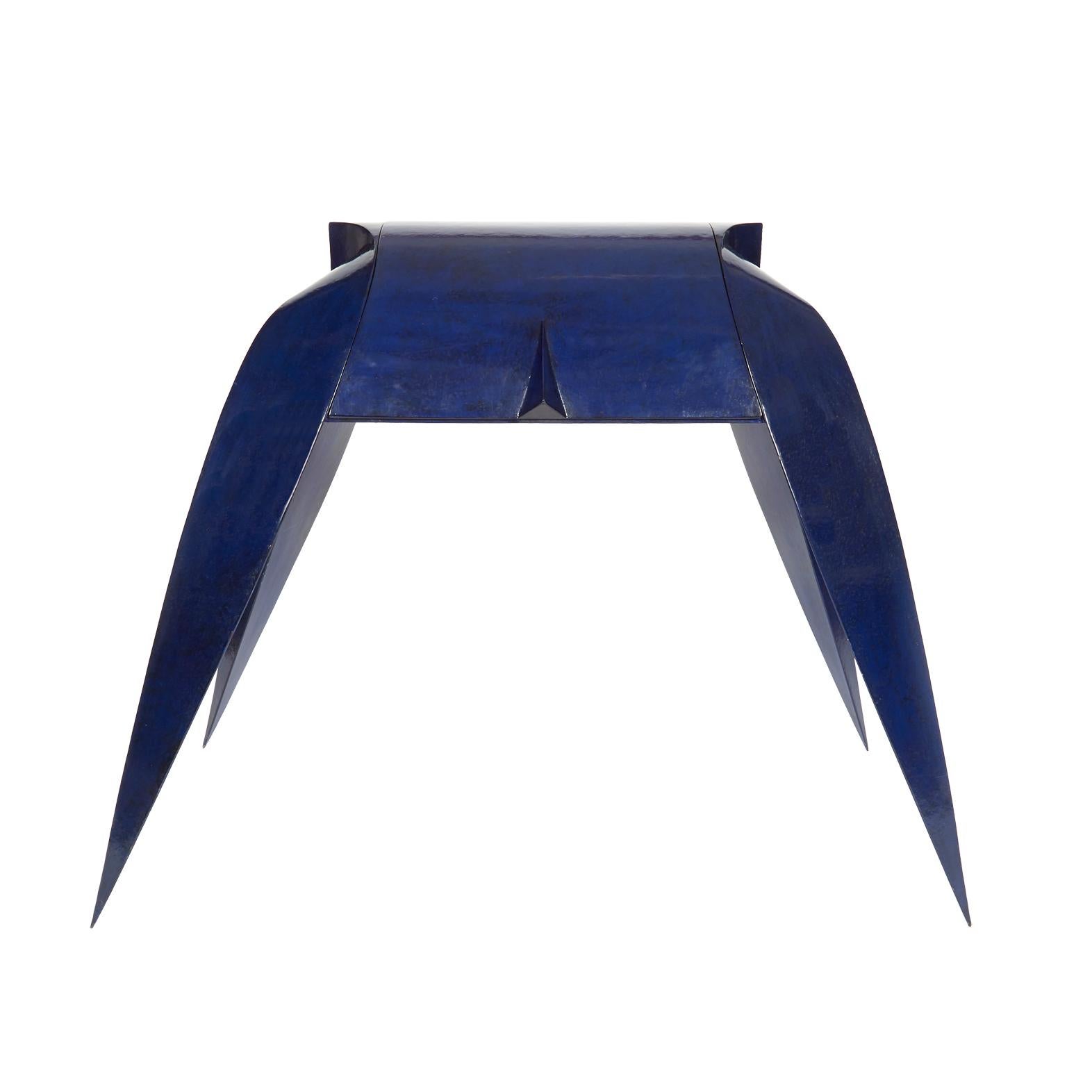 Very unusual biomorphic shaped blue metal secretaire by Yves Pogort. Lid lifts to reveal inner compartment with a bevelled edge vanity mirror, small desk surface and 2 swivel drawers. The pieces is signed, dated and numbered on the underside, “Yves