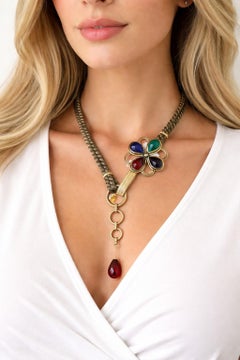 Cintura/collana Yves S. Laurent con finiture in lurex e cabochon in vetro, circa 1968