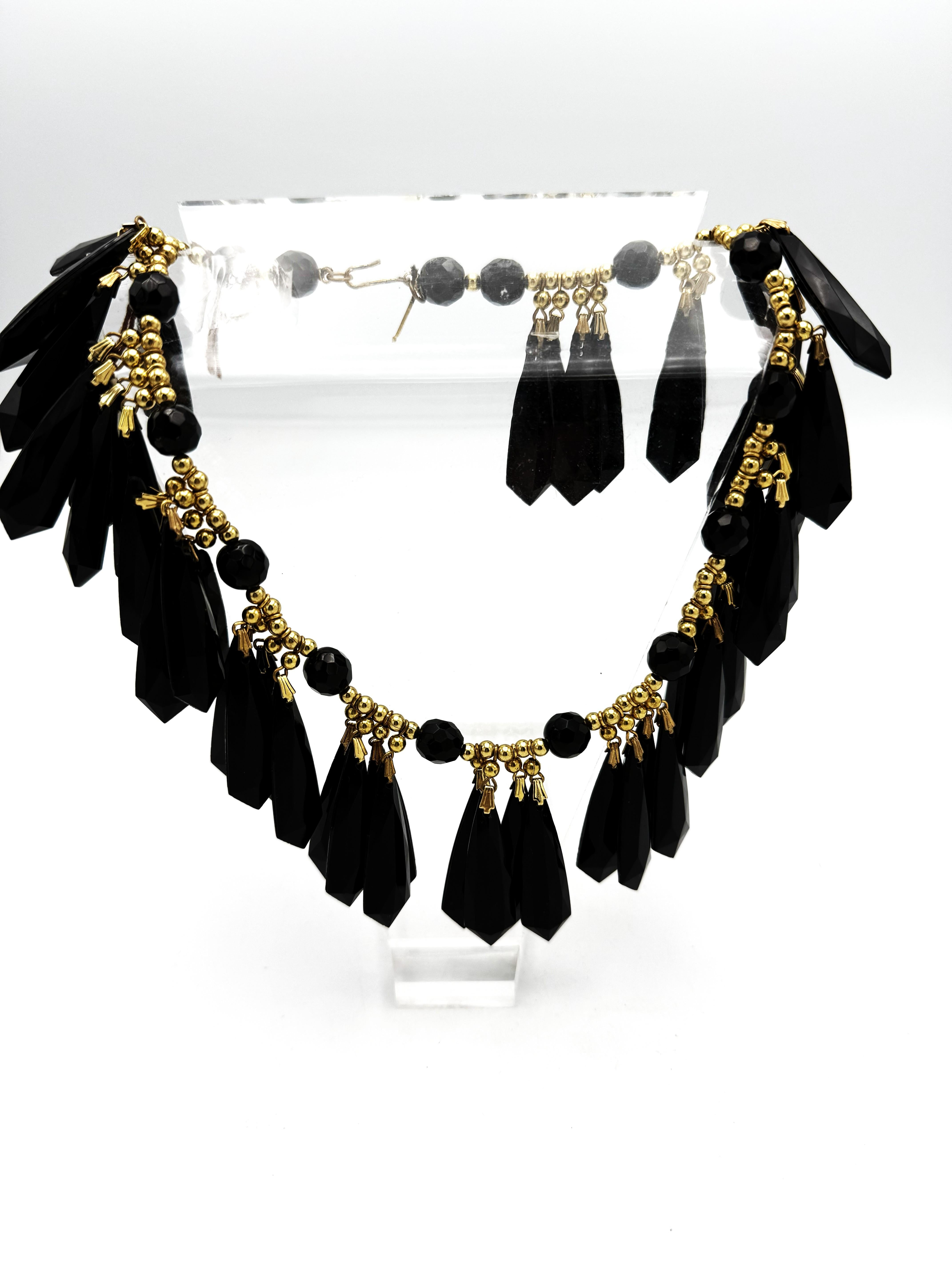 Yves Saint Lauren, prè-à-porter, 1980, métal doré,  col à pompon en résine noir de jais Pour femmes en vente