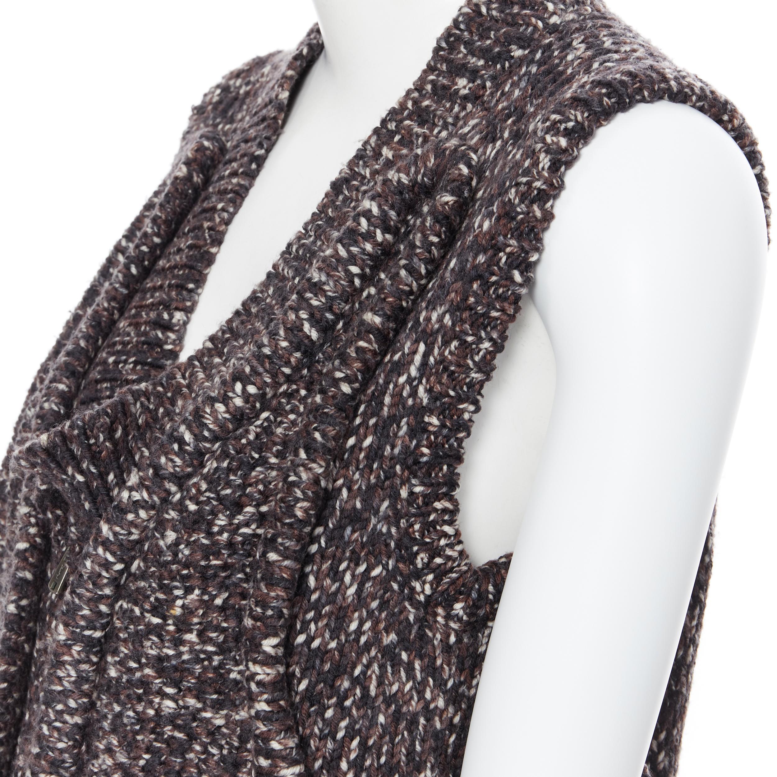YVES SAINT LAURENT 100% wool brown cable knit zip front dual pocket vest  XS
Brand: Yves Saint Laurent
Model Name / Style: Knitted vest
Material: Wool
Color: Brown
Pattern: Solid
Extra Detail: Zip front closure.
Made in: Italy

CONDITION: