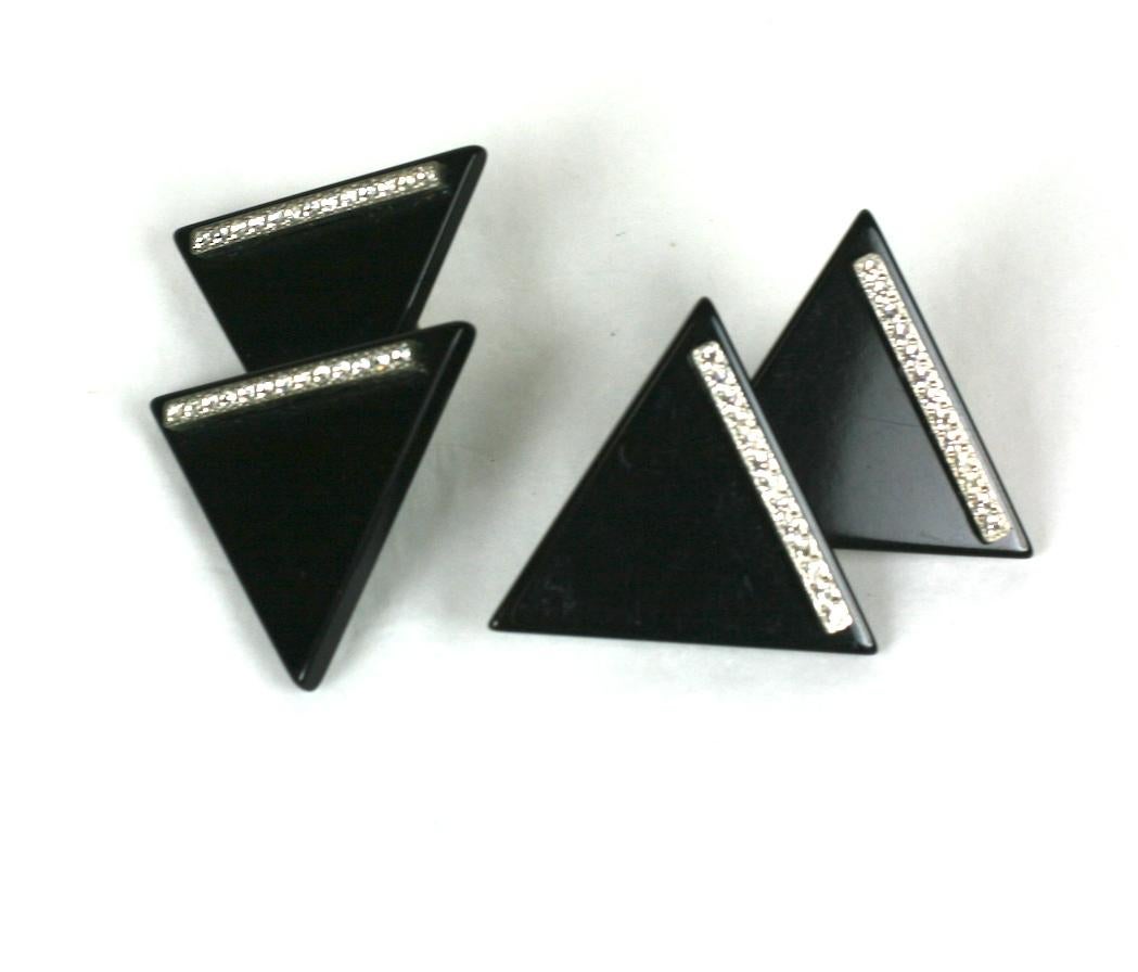 Yves Saint Laurent 1970s bakelite earclips.  Designed in the Art Deco Revival taste, black bakelite overlapping triangles are set with two rows of crystal rhinestones.
Excellent Condition, Unsigned. Clip back fittings. 
Length  2