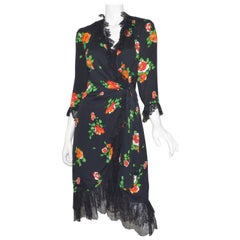 Yves Saint Laurent 1970
s Floral Print Wrap Dress with Lace