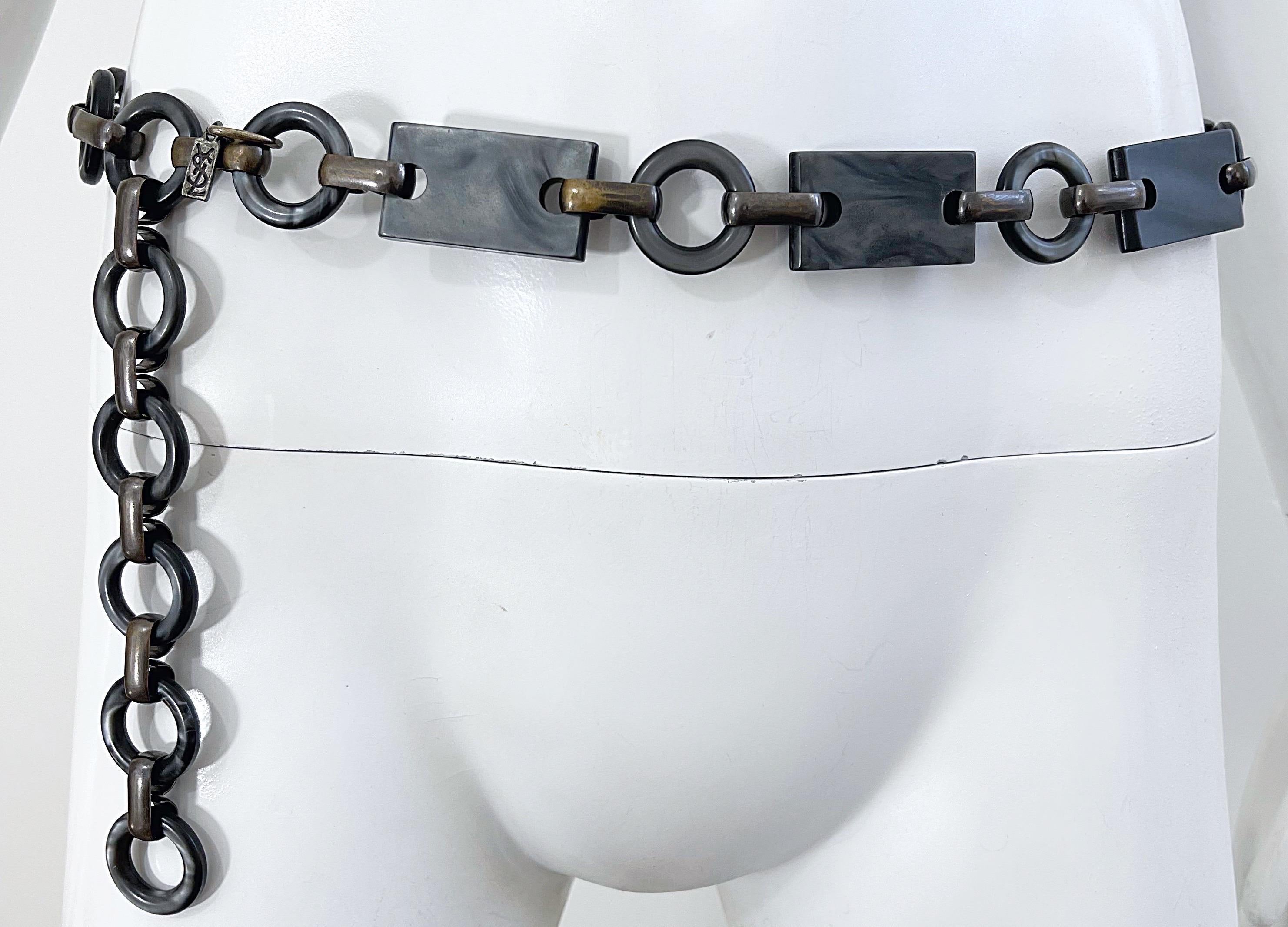 Fabulous 1970s YVES SAINT LAURENT gray / gunmetal marbled lucite chain link belt or necklace ! Signature YSL logo on attached silver metal plate. Features a slight iridescent sheen, especially in the right light. Dress up or down as a belt or as a