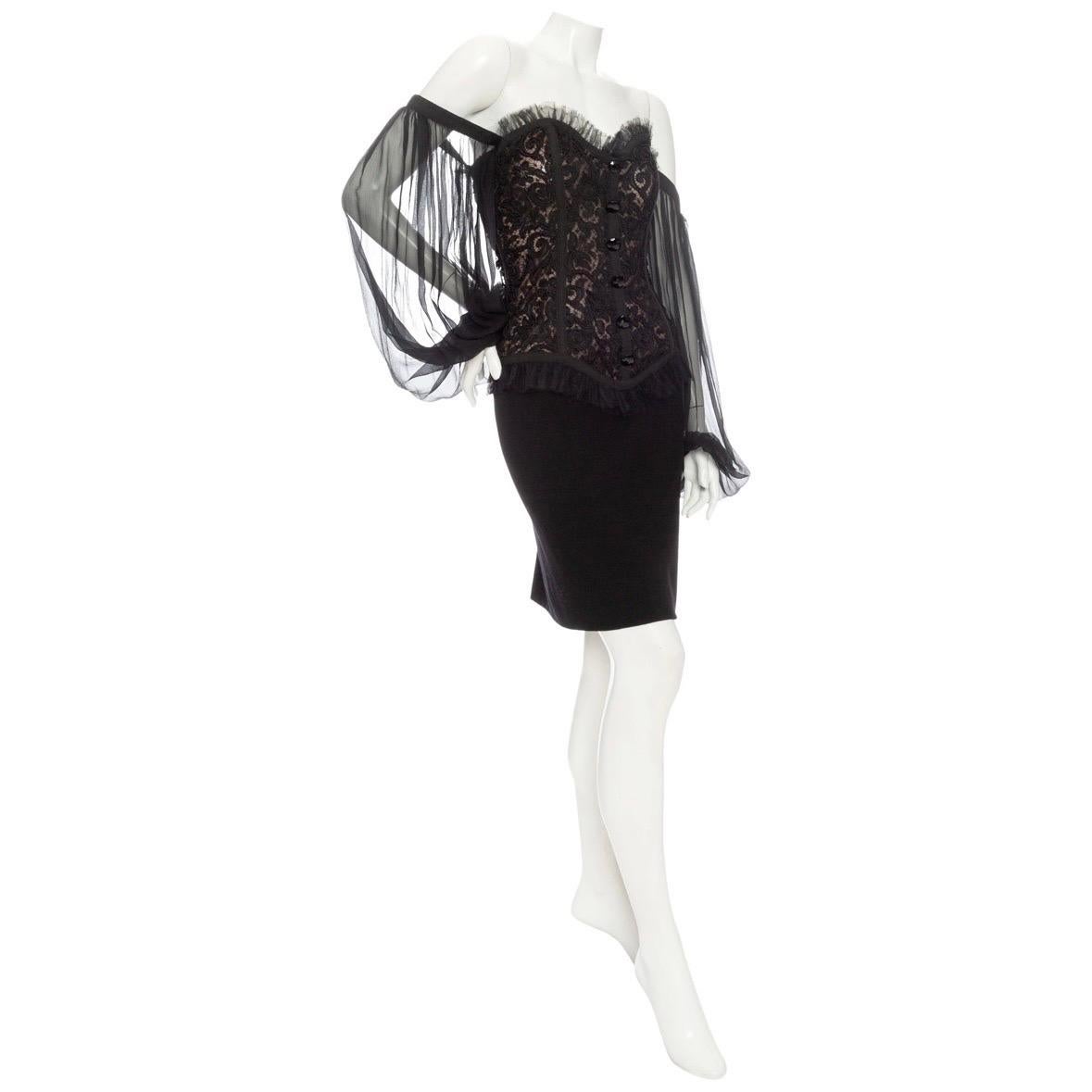 Yves Saint Laurent 1980s Black Off-the-Shoulder Lace Bustier Dress

Circa 1980s
Rive Gauche line
Black/Brown
Sweetheart neckline
Off-the-shoulder sheer balloon sleeves
Bustier with lace overlay
Front decorative buttons
Grosgrain and tulle