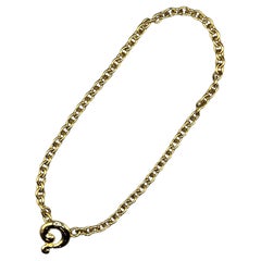 Yves Saint Laurent, collier pendentif en or, années 1980