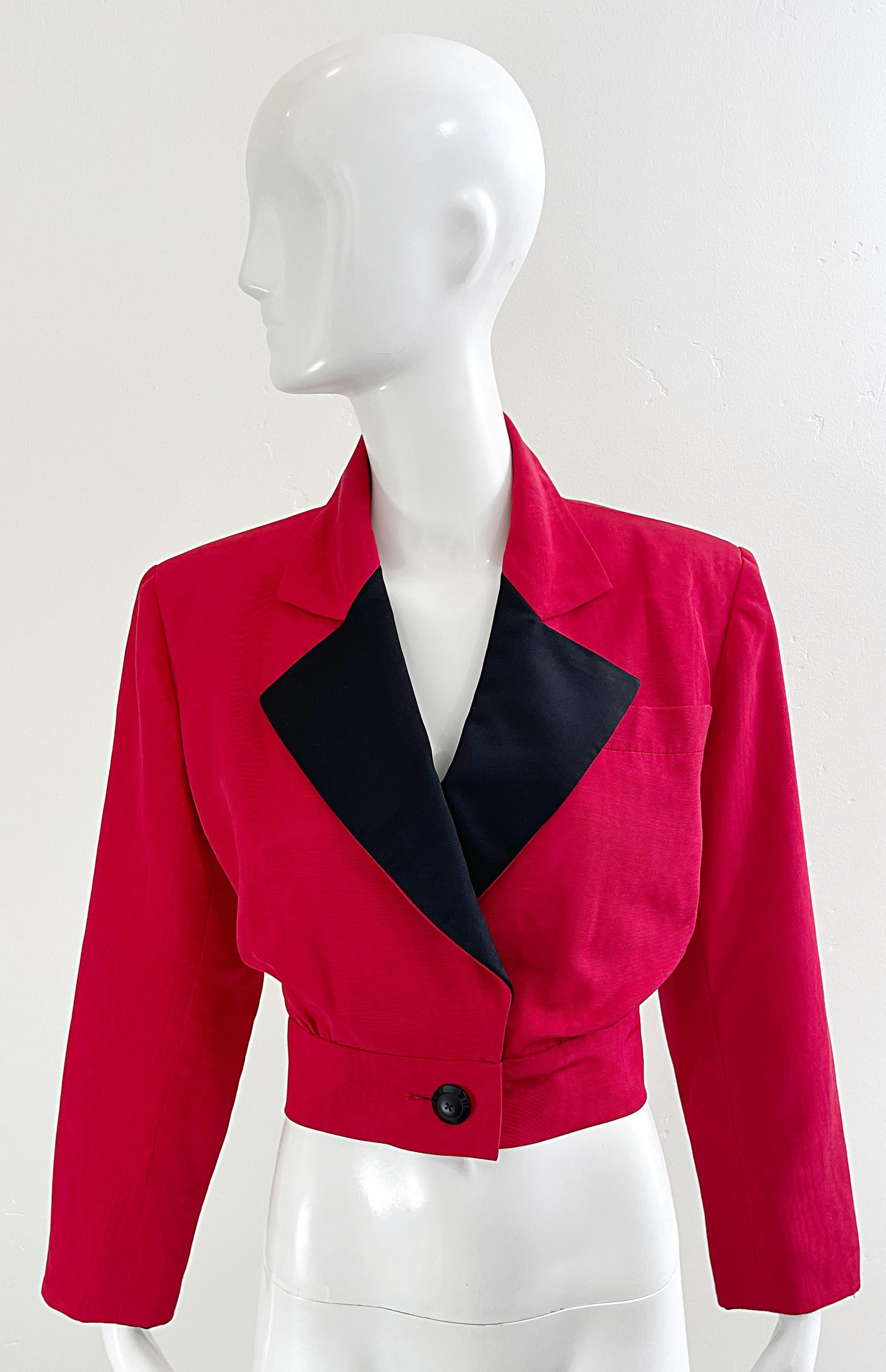 Chic early 80s YVES SAINT LAURENT Rive Gauche red and black silk cropped blazer jacket ! Features a lipstick red body with exaggerated signature black lapels. Single button closure. Fully lined. Can easily be dressed up or down. Pair with jeans, a