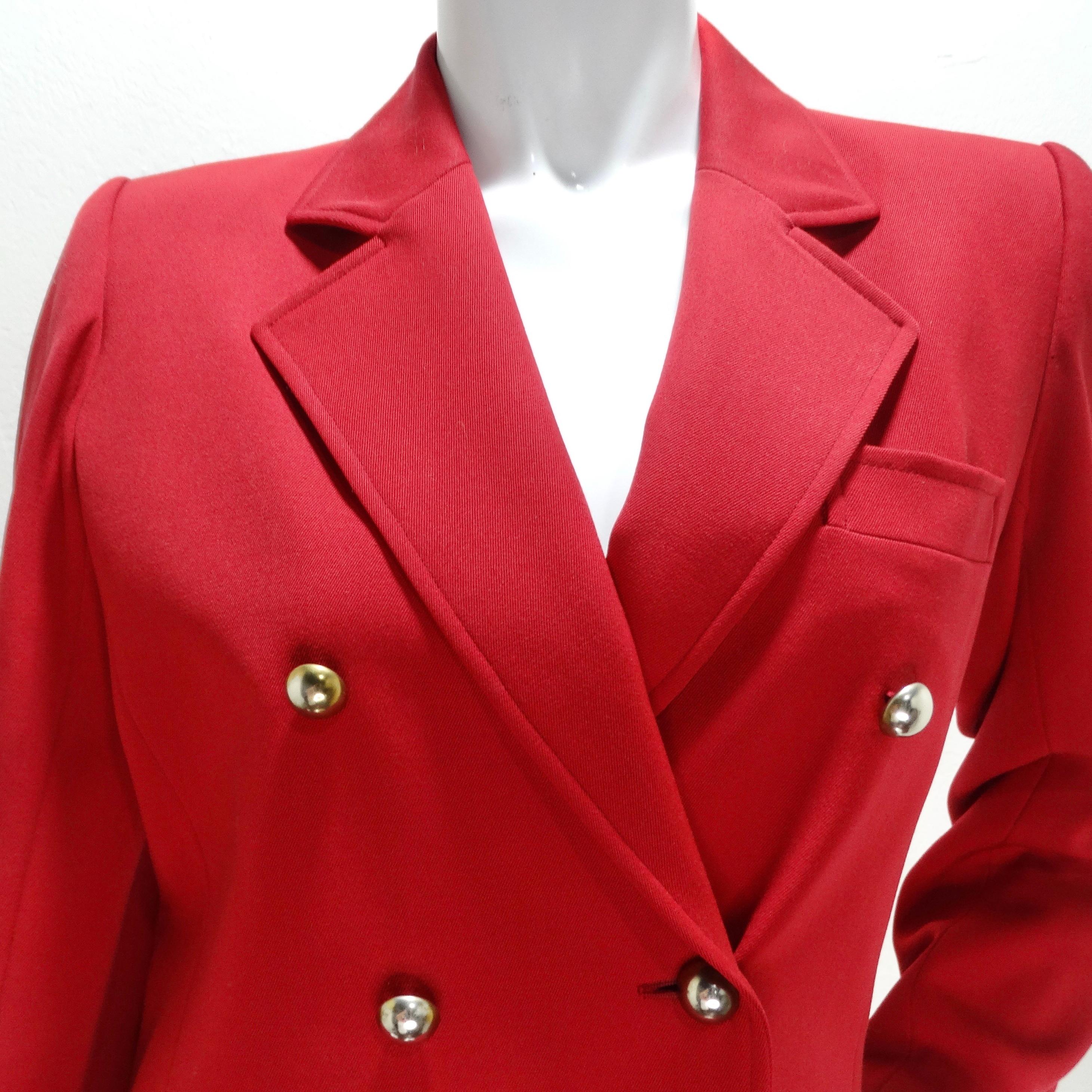Elevate your style with this striking Yves Saint Laurent 1980s Red Blazer, a classic women's blazer with a twist of 1980s flair. This statement piece features a structured collar, center pockets, and gold-tone buttons with a mirror-like effect that