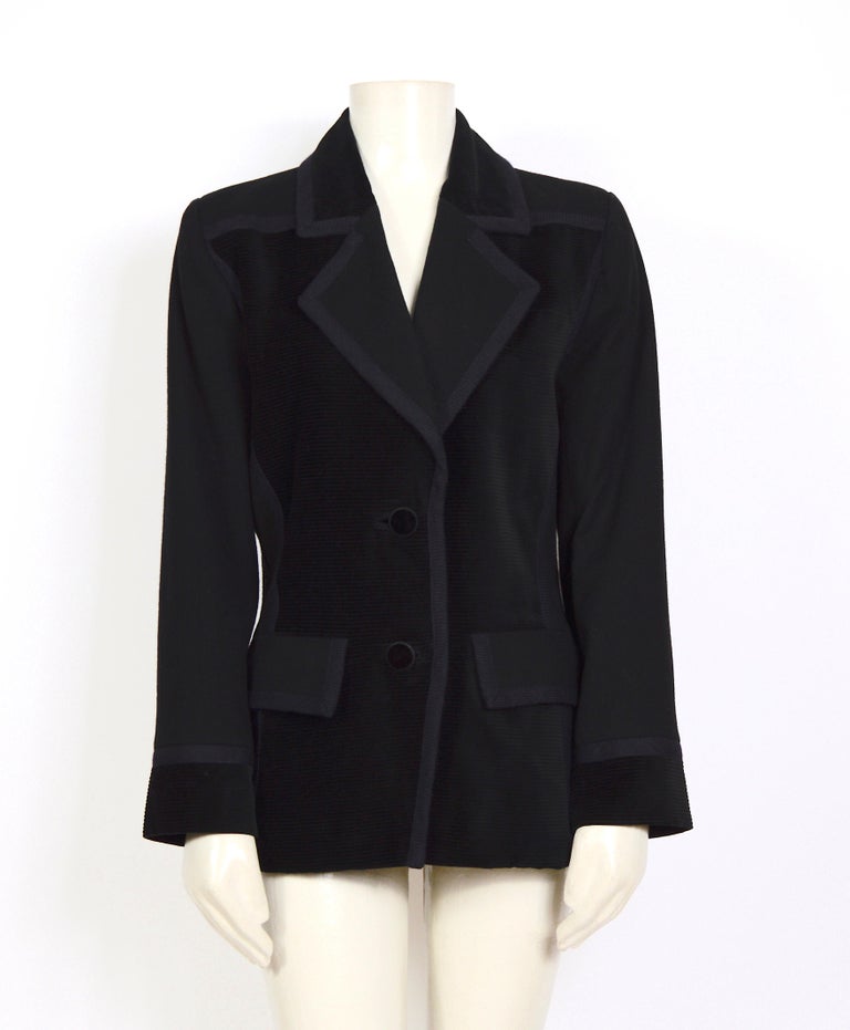 Yves Saint Laurent at his best. 
Black ribbed corduroy velvet and woolen cloth jacket, French size 38, in perfect vintage condition.
Measurements are taken flat:
Sh to Sh 16inch/41cm - Ua to Ua 20inch/51cm(x2) - Waist 17inch/43cm(x2) - Sleeve