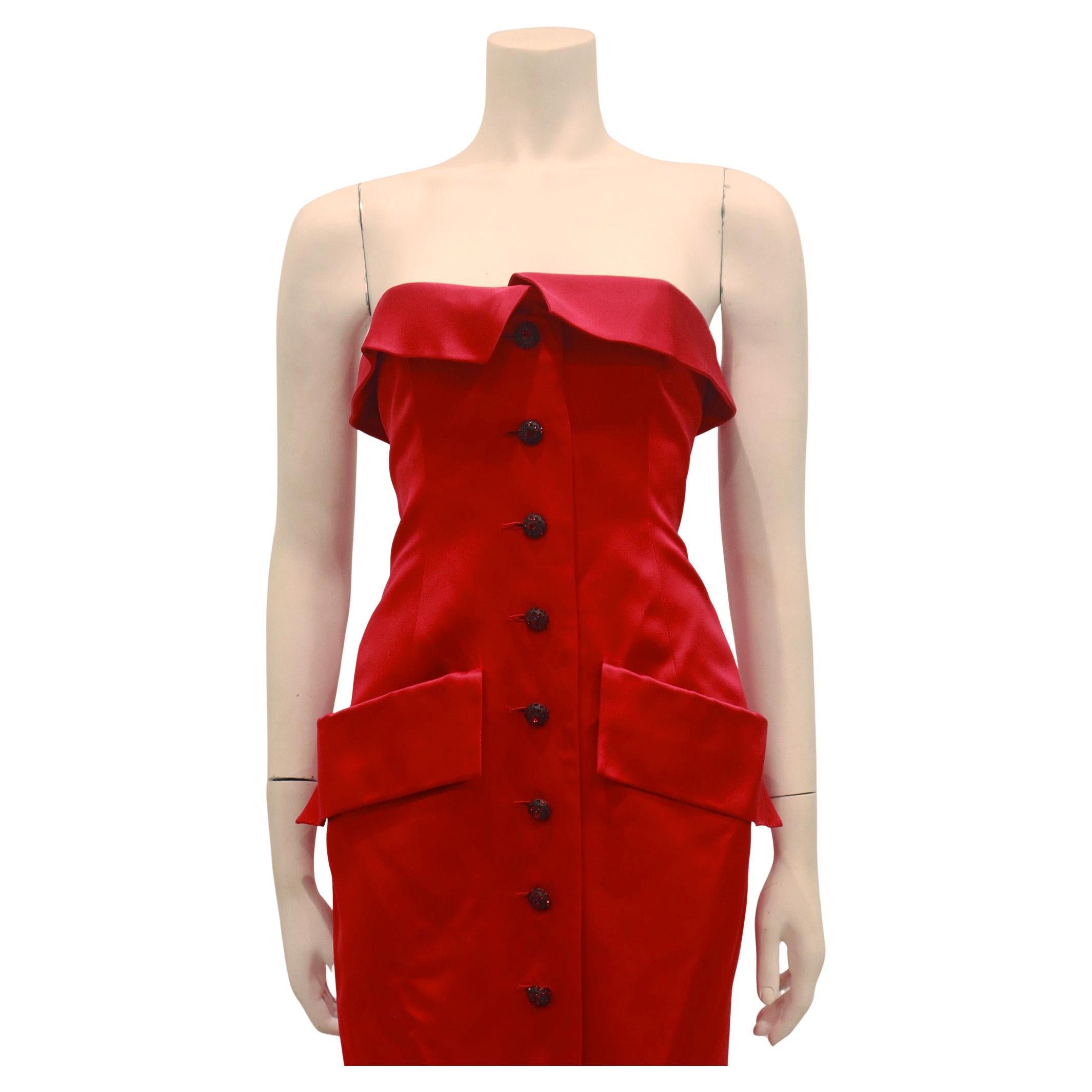 Yves Saint Laurent 1983 red silk strapless, button front evening gown with pockets. 

This evening gown is in 'LIKE NEW' condition. 

There are no significant flaws or wear areas to consider with this lovely evening gown. It had been very gently