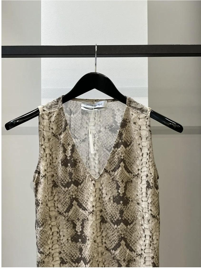 Yves Saint Laurent
2002 Tom Ford Silk Snakeskin Top
Size Small

Beautiful Yves Saint Laurent 2002 Tom Ford silk snakeskin top in a size small. Stunning piece when Tom Ford was designing for Yves Saint Laurent at the time. In great condition, made in