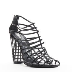 YVES SAINT LAURENT 2009 Runway Cage 110 black graphid grid patent bootie  EU37