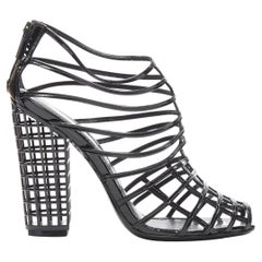 YVES SAINT LAURENT 2009 Runway Cage 110 black graphid grid patent bootie  EU37