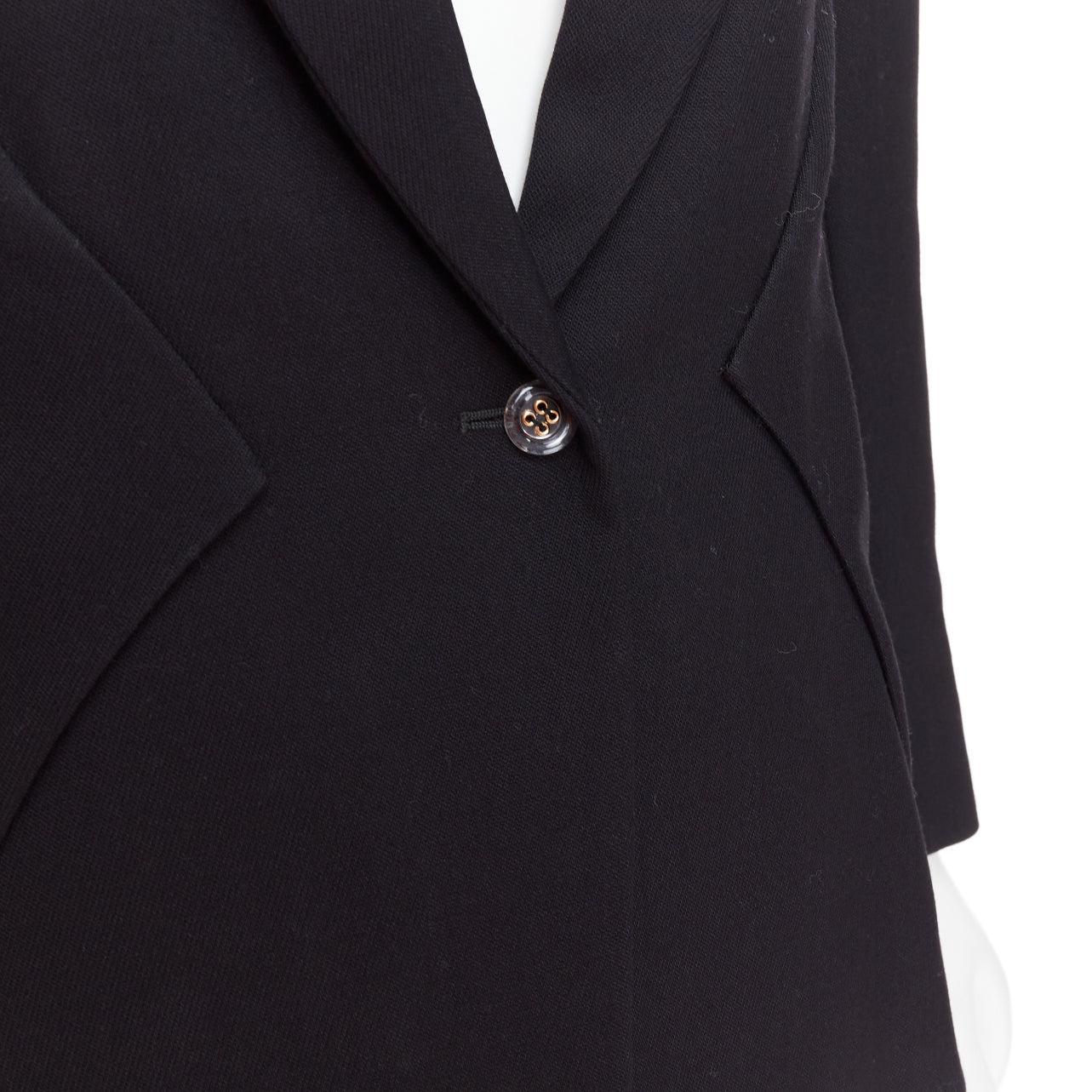 YVES SAINT LAURENT 2010 black wool blend deconstructed blazer FR36 S
Reference: GEGG/A00067
Brand: Yves Saint Laurent
Designer: Stefano Pilati
Collection: AW 2010 - Runway
Material: Wool, Blend
Color: Black
Pattern: Solid
Closure: Button
Lining: