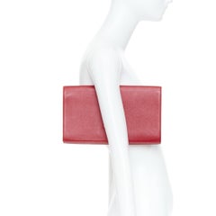 YVES SAINT LAURENT 2011 Belle de Jour raised logo red leather envelope clutch