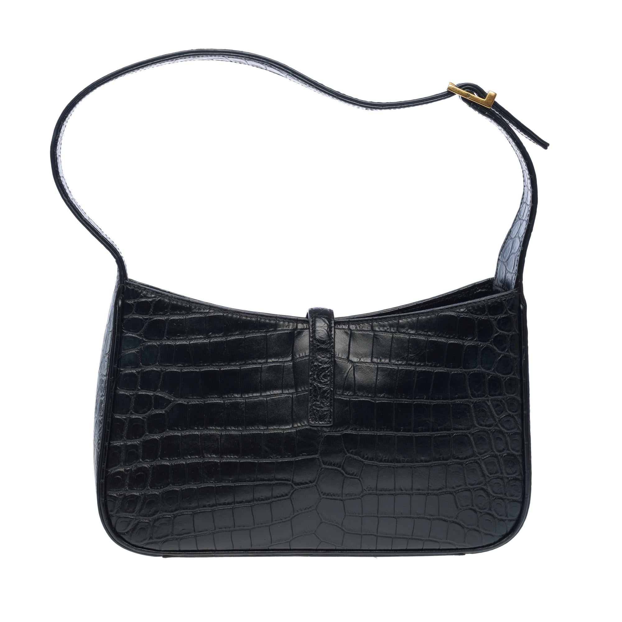 Women's or Men's Yves Saint-Laurent 5 à 7 hobo bag in black calf leather, GHW