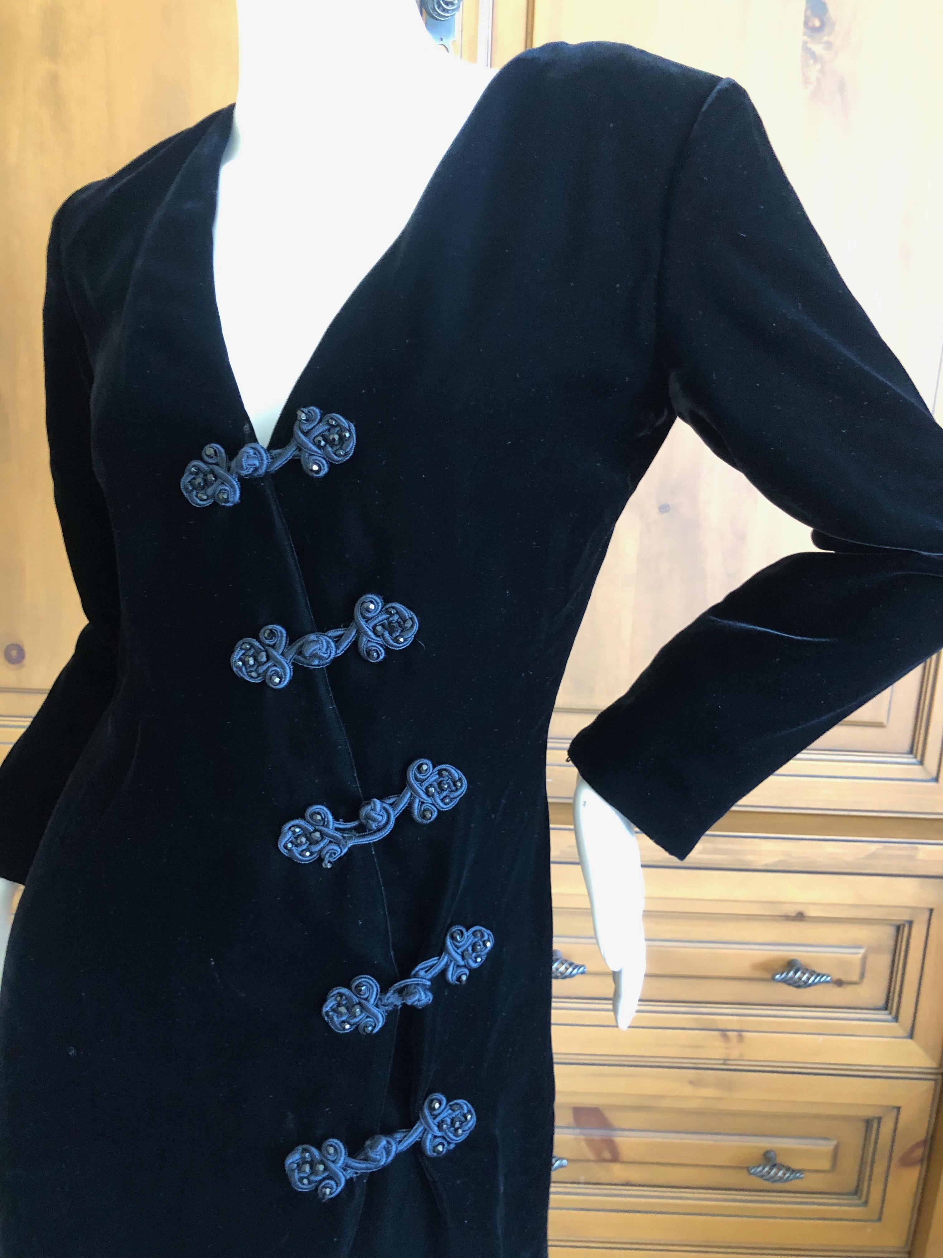 Yves Saint Laurent 70's Rive Gauche Velvet Mini Dress with Diagonal Frog Closure.
This is so pretty, inspired by the Cheongsam , with turquoise silk lining and beaded frog closures.
 Size 44
Bust 39