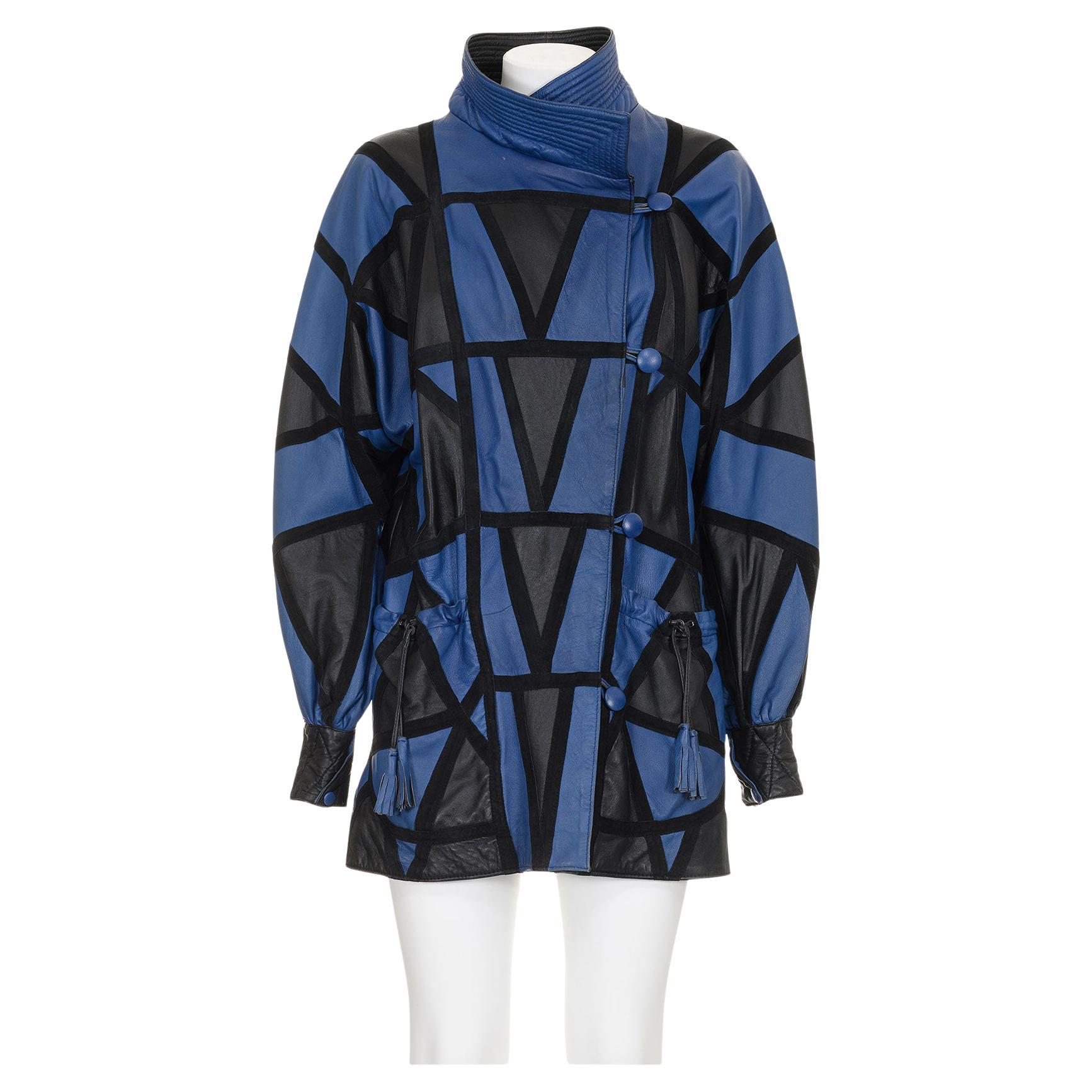 Yves Saint Laurent anni
80 Cappotto in pelle patchwork con finiture in pelle scamosciata