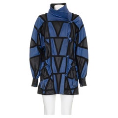 Yves Saint Laurent anni
80 Cappotto in pelle patchwork con finiture in pelle scamosciata