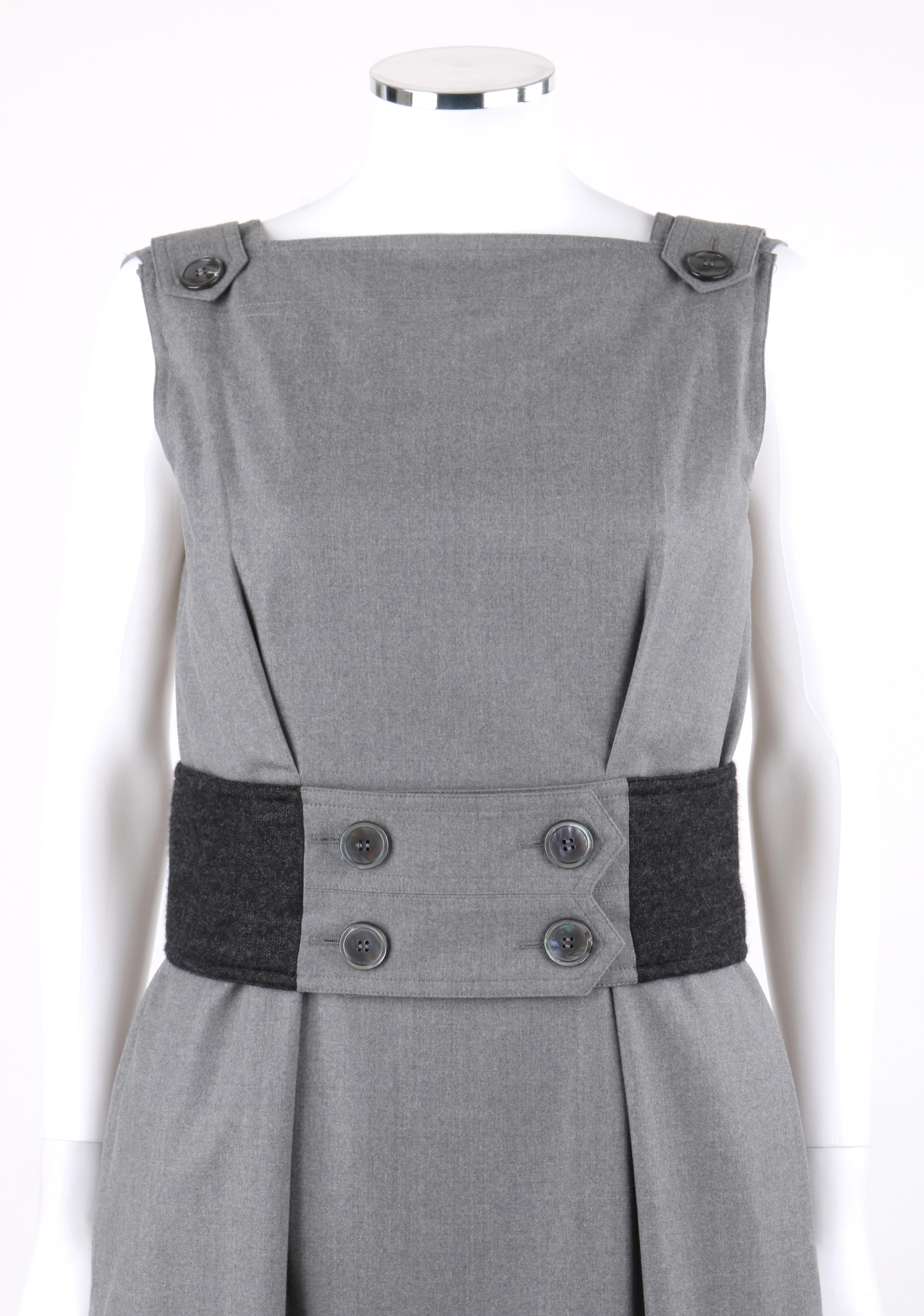 YVES SAINT LAURENT A/W 2007 Gray Button Up Belt Sleeveless Plunge Back Dress

Brand / Manufacturer: Yves Saint Laurent
Collection: A/W 2007
Designer: Stefano Pilati
Style: Sleeveless sheath dress 
Color(s): Shades of gray 
Lined: Yes
Marked Fabric