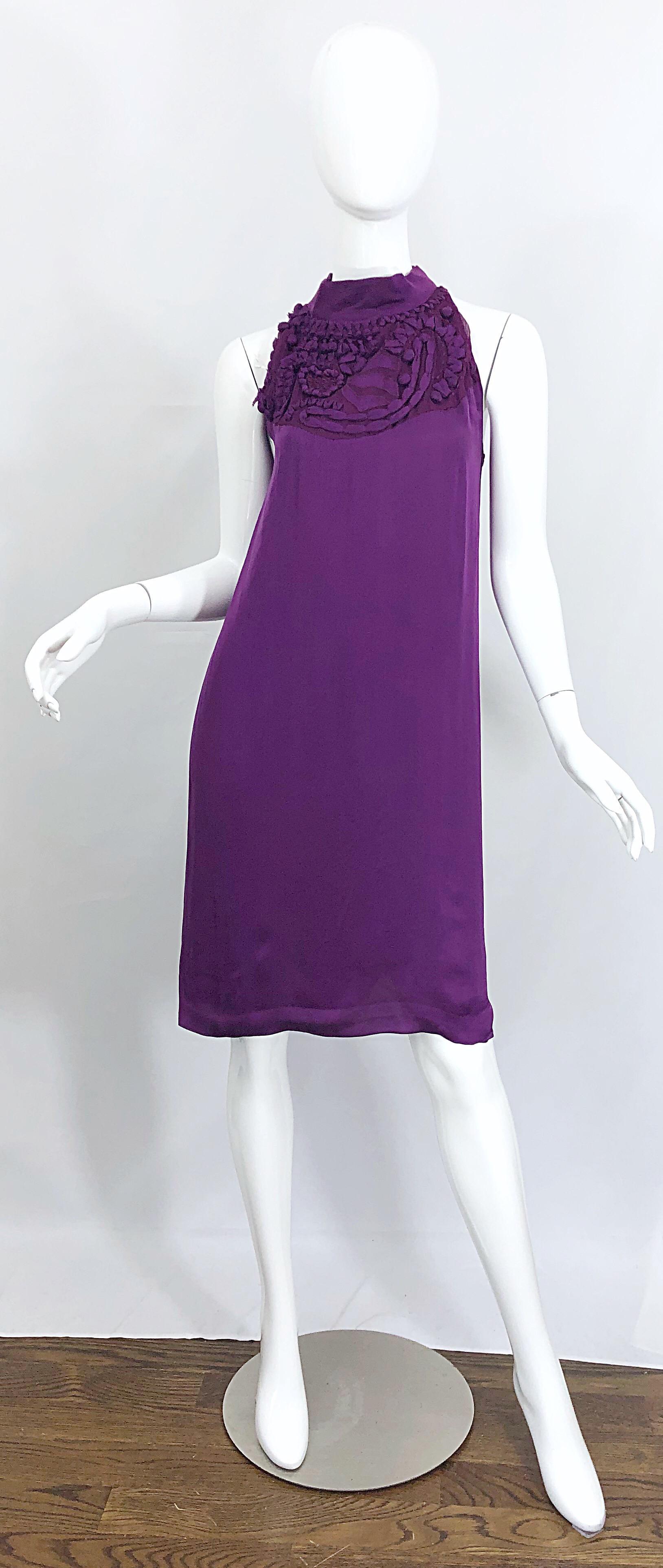 Chic YVES SAINT LAURENT Autumn / Winter 2007 purple silk dress! Features intricate details above bust. Single button closure at back neck. Fully lined. Can easily be worn day to evening. Perfect with sandals, wedges or flats for day, and heels or