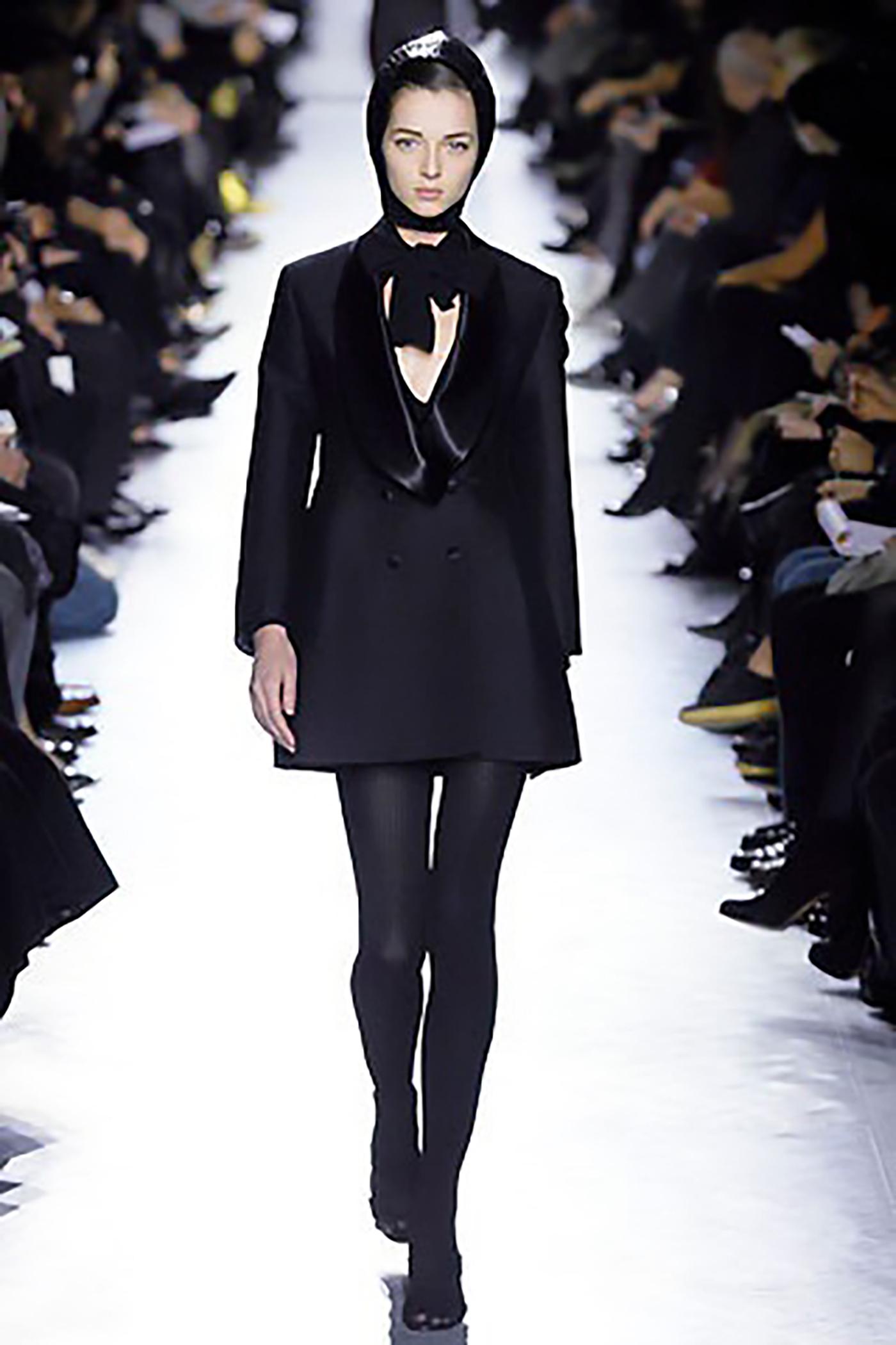 The perfect black tuxedo jacket by Yves Saint Laurent - designed by Stefano Pilati for his 2007 Autumn Winter collection. This Le Smoking style jacket was look number 34 on the runway.

This stunning tuxedo jacket is made from a beautiful silk wool