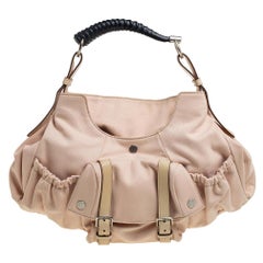 Bolso Mala Yves Saint Laurent de lona y piel beige con cuerno