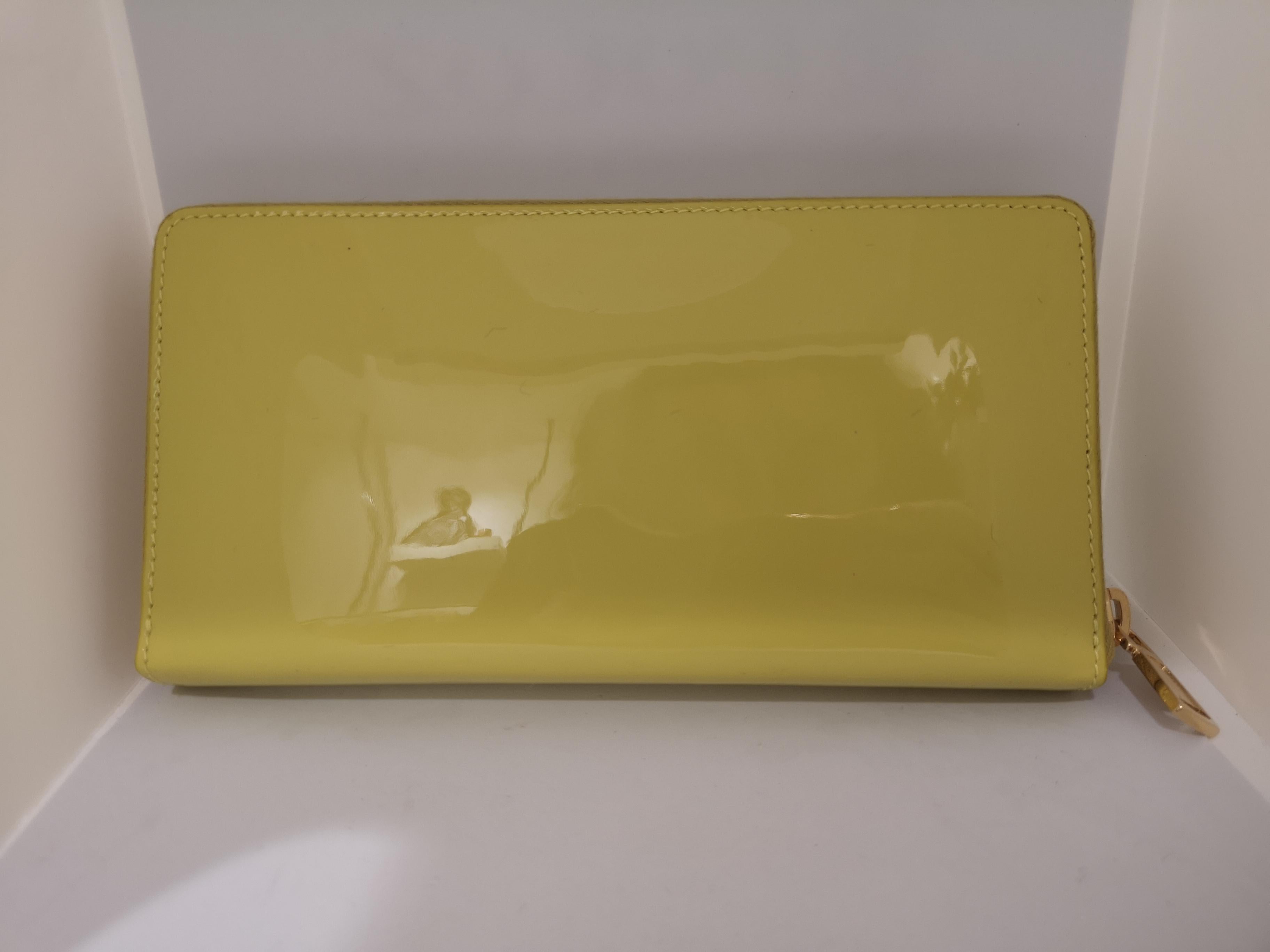 Yves Saint Laurent Belle De Jour Patent Leather Zip Around Wallet NWOT 
Never used, still with tags and box