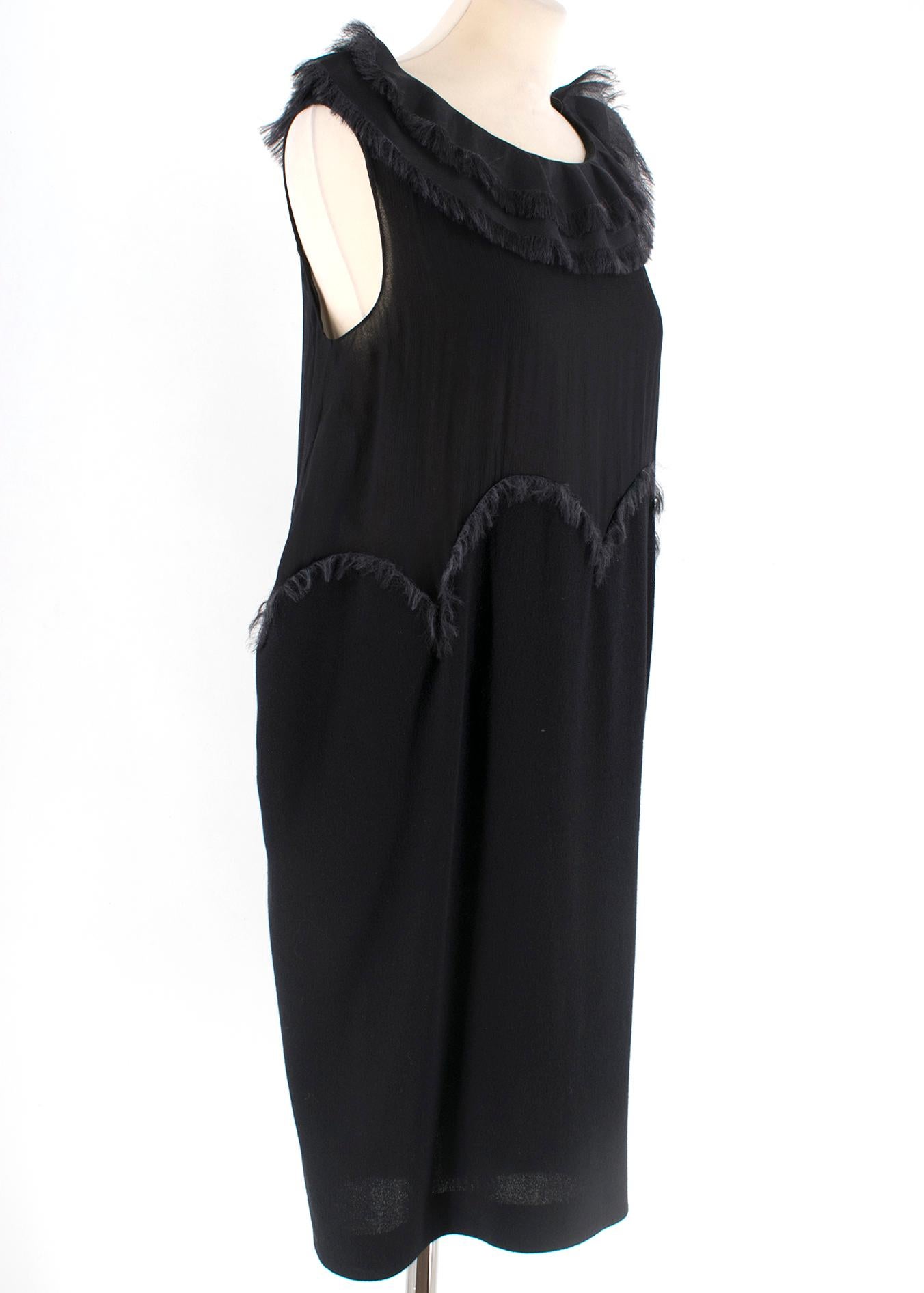 Yves Saint Laurent Black Chiffon Trim Mini Dress

-Back zip(in a good condition)
-Feather Neck and stomach trim
-Tulip shape 

Please note, these items are pre-owned and may show signs of being stored even when unworn and unused. This is reflected