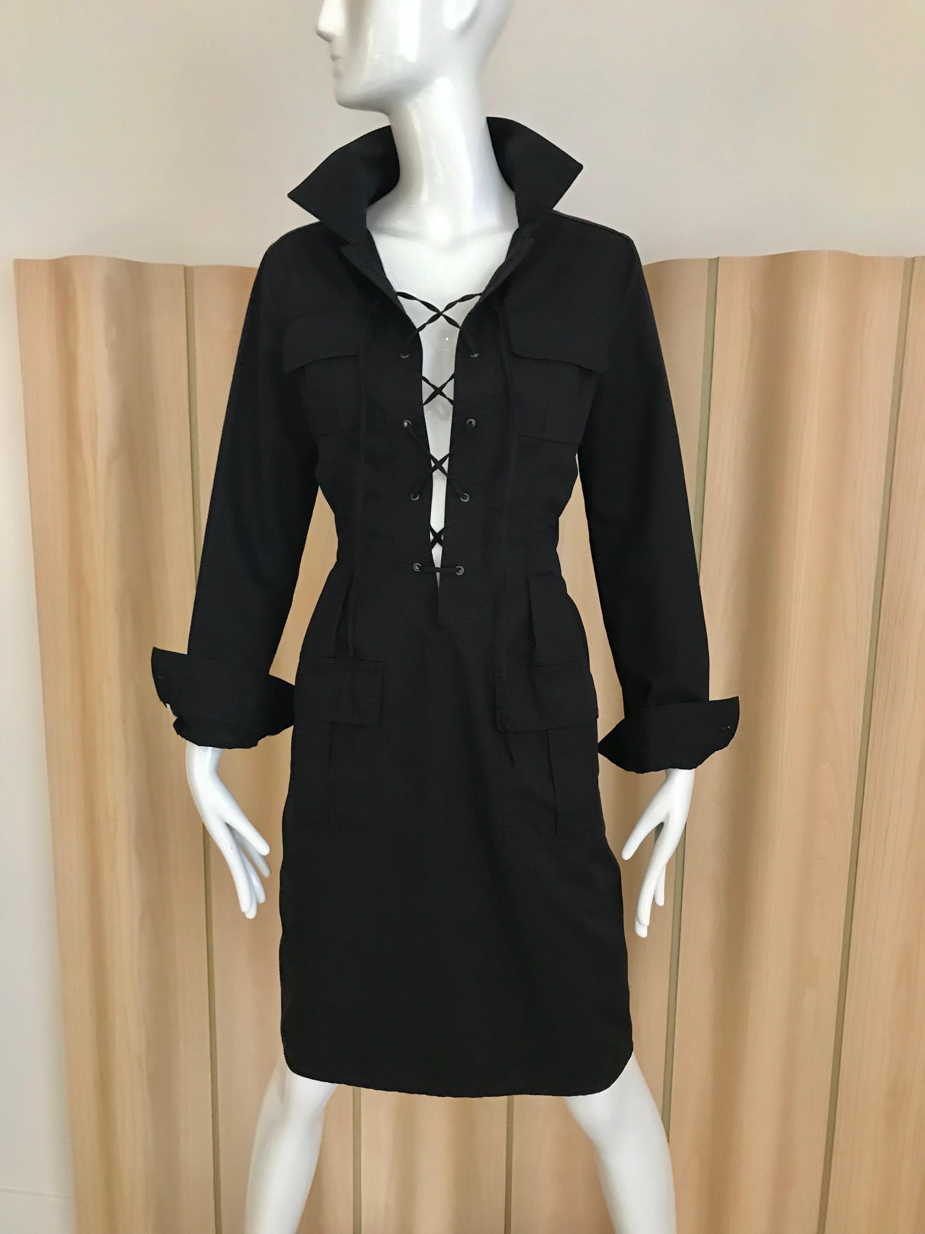 Vintage Yves Saint Laurent Long sleeve back cotton lace up safari style dress. Knee length and dress is missing belt. Size F36. US SIZE 4
Measurement: 
Bust: 34 inches