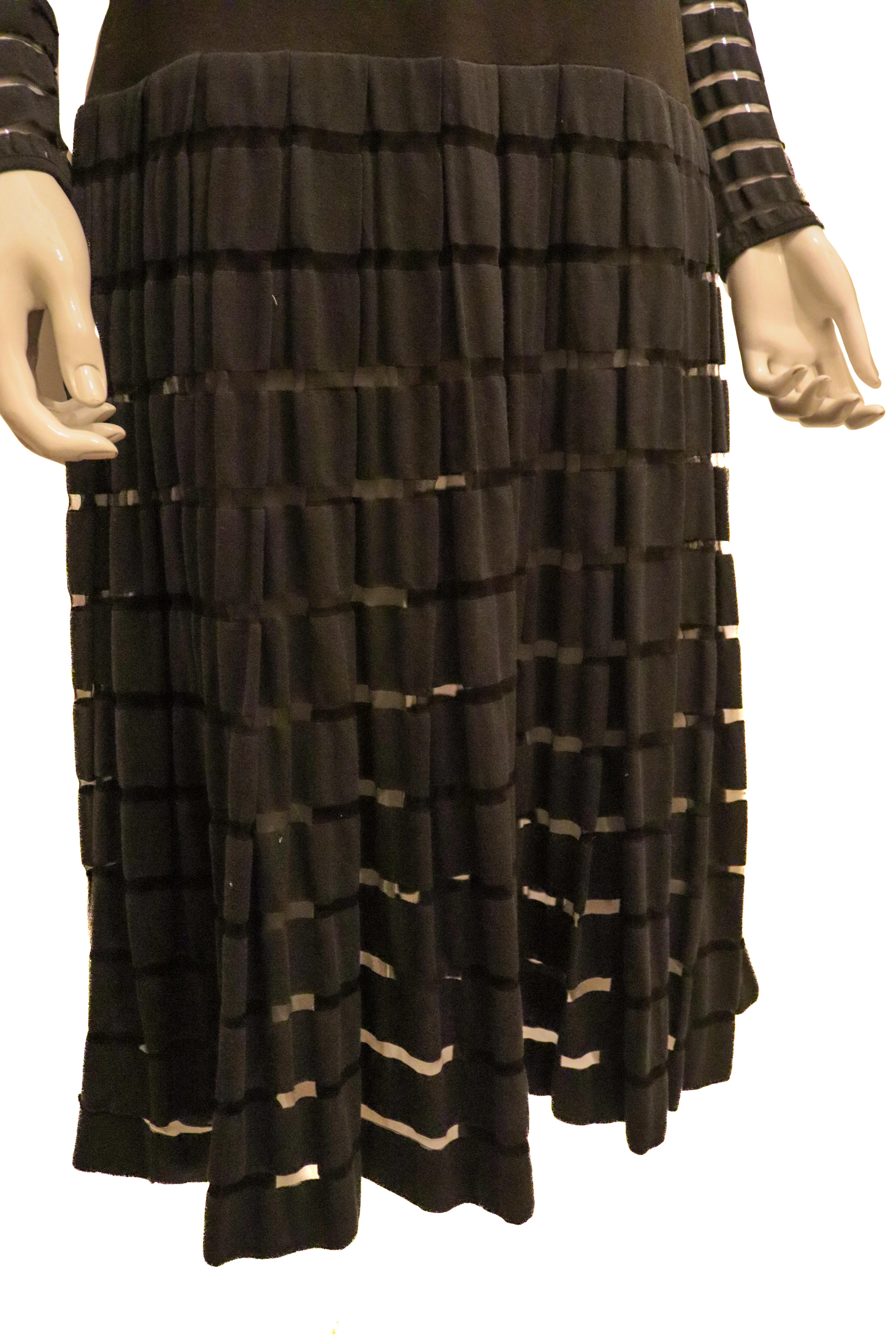 Women's Yves Saint Laurent Black Dress with Interesting Sleave and Hem detail For Sale