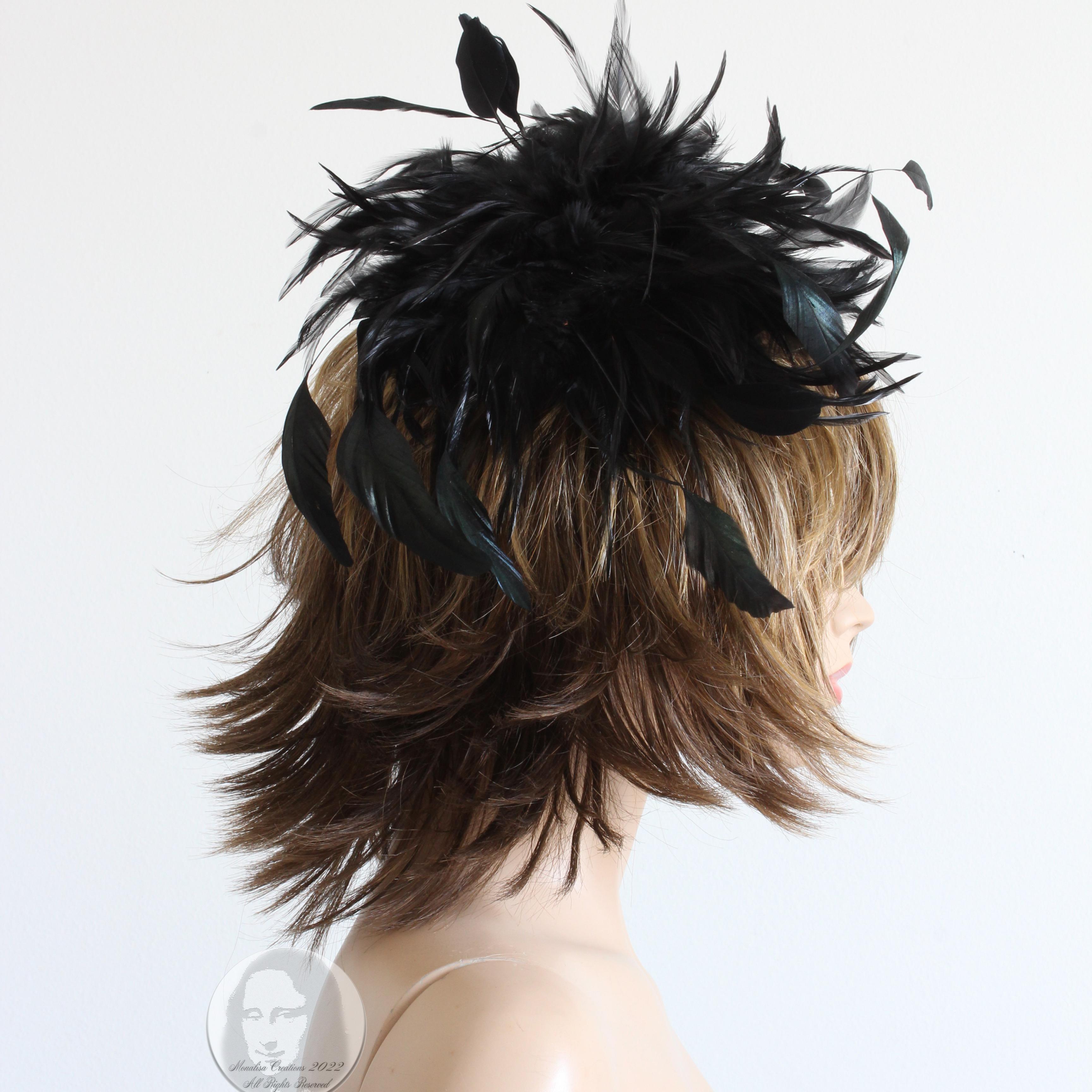 This rare feather cap was made by Yves Saint Laurent, most likely in the late 70s or early 80s. Made from a combination of black ostrich and longer plume feathers with black fabric layers in between, all of which are affixed to a netted fabric base