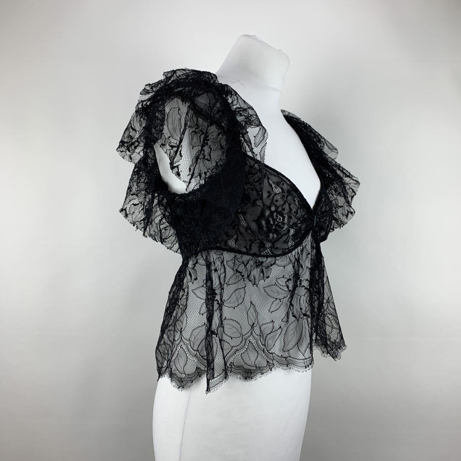 Yves Saint Laurent Black Lace Sheer Top. Frills detailing . Cropped length. Fabric / Material: 1st fabric:60% Viscose - 40% Nylon / 2nd fabric:80% Nylon - 20% Elastan. Color / Effect:Black Size: M (The size shown for this item is the size indicated