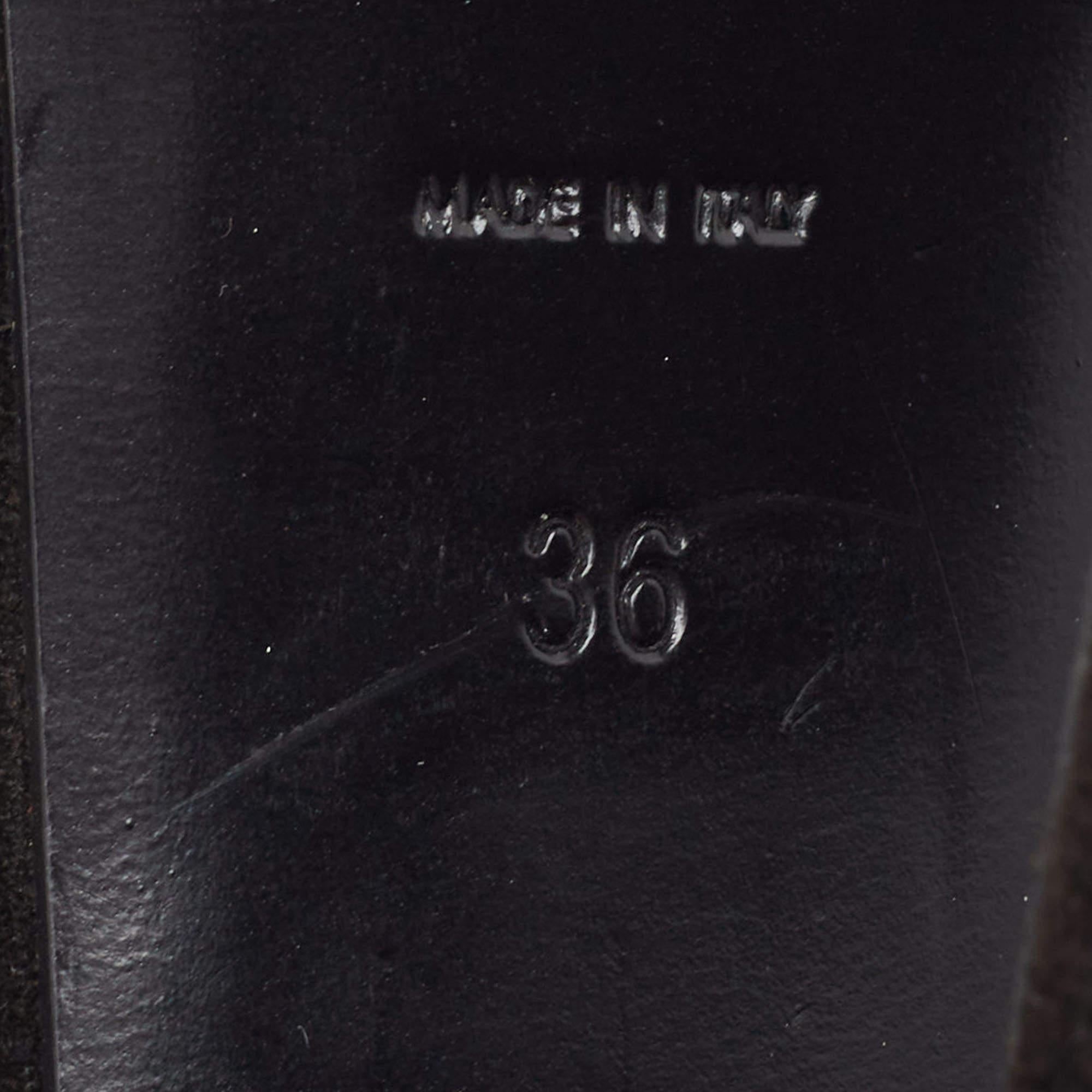 Yves Saint Laurent Schwarze Tribtoo-Pumps aus Leder und Lackleder Größe 36 im Angebot 4