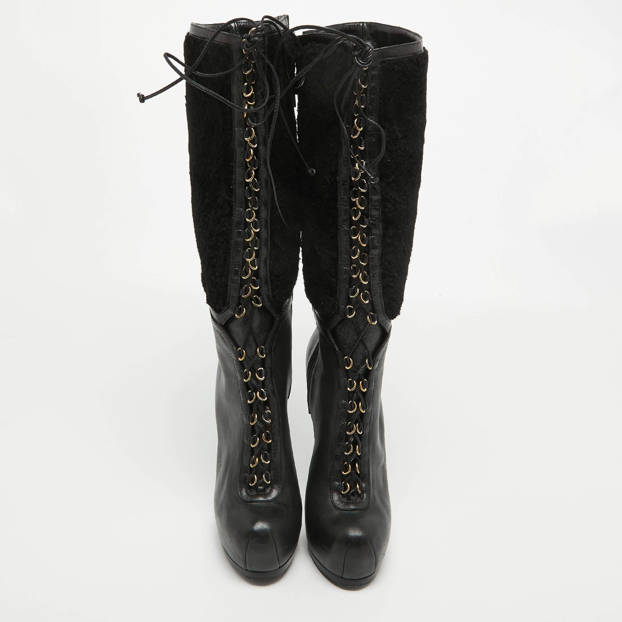 Enjoy the most fashionable days with these YSL platform boots. Modern in design and craftsmanship, they are fashioned to keep you comfortable and chic!

Includes
Original Dustbag, Original Box