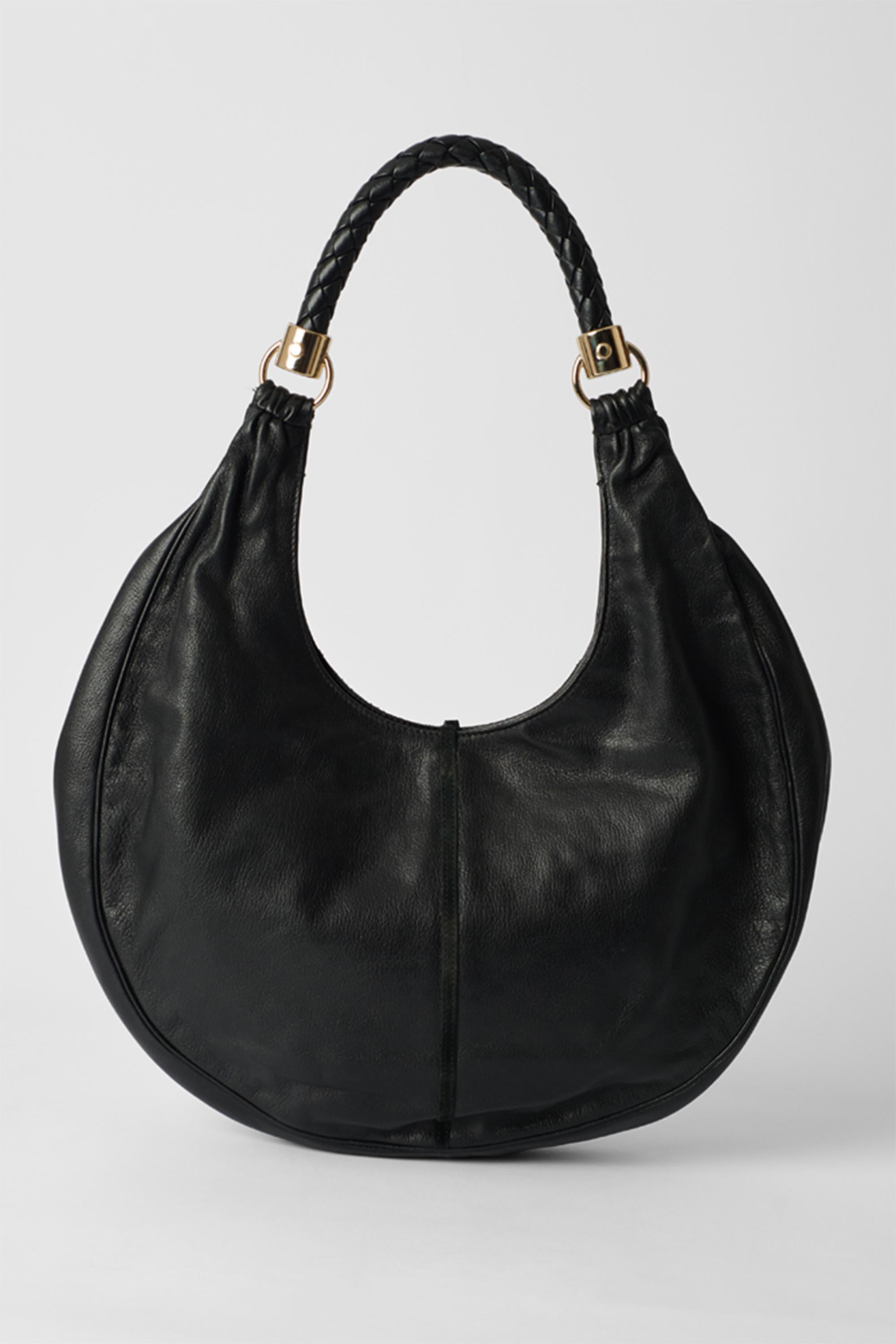 Yves Saint Laurent  Black Leather Hobo Bag with Tassel In Excellent Condition In London, GB