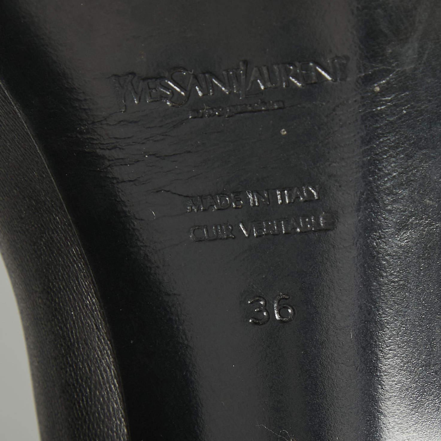 Yves Saint Laurent Schwarze knielange Plateaustiefel aus Leder Größe 36 im Angebot 1