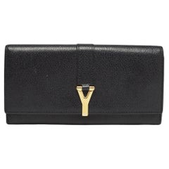 Yves Saint Laurent Portefeuille continental à rabat en cuir noir Y Line