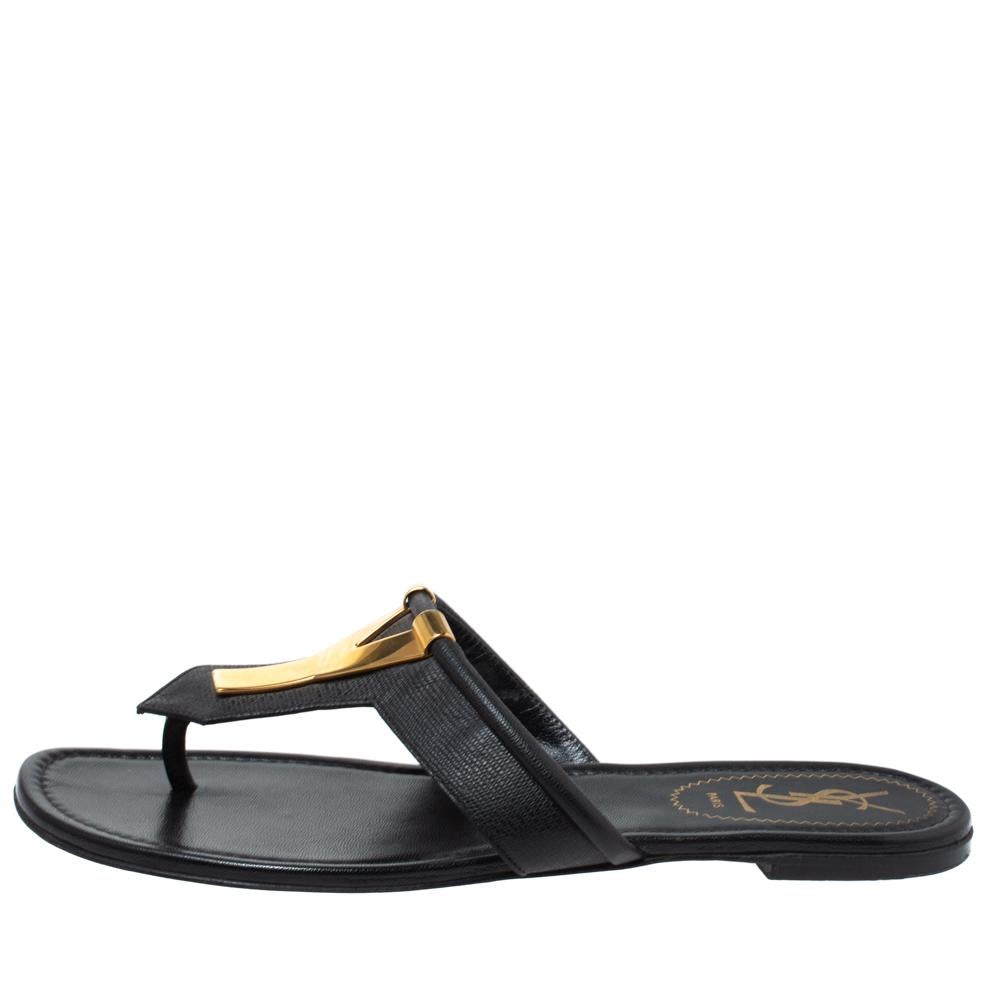 Brighten up a casual look with these stunning Ycon sandals from Yves Saint Laurant. Crafted from black leather, these thong sandals are accented with large ‘Y’s on the vamps and feature leather-lined insoles.

