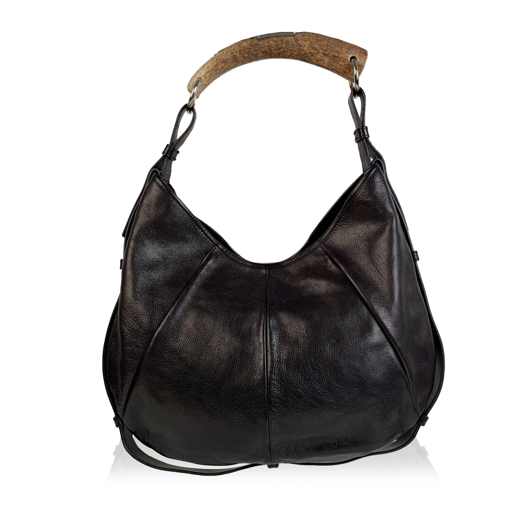 Yves Saint Laurent Black Leather Ysl Studded Mombasa Hobo Bag In Excellent Condition In Rome, Rome