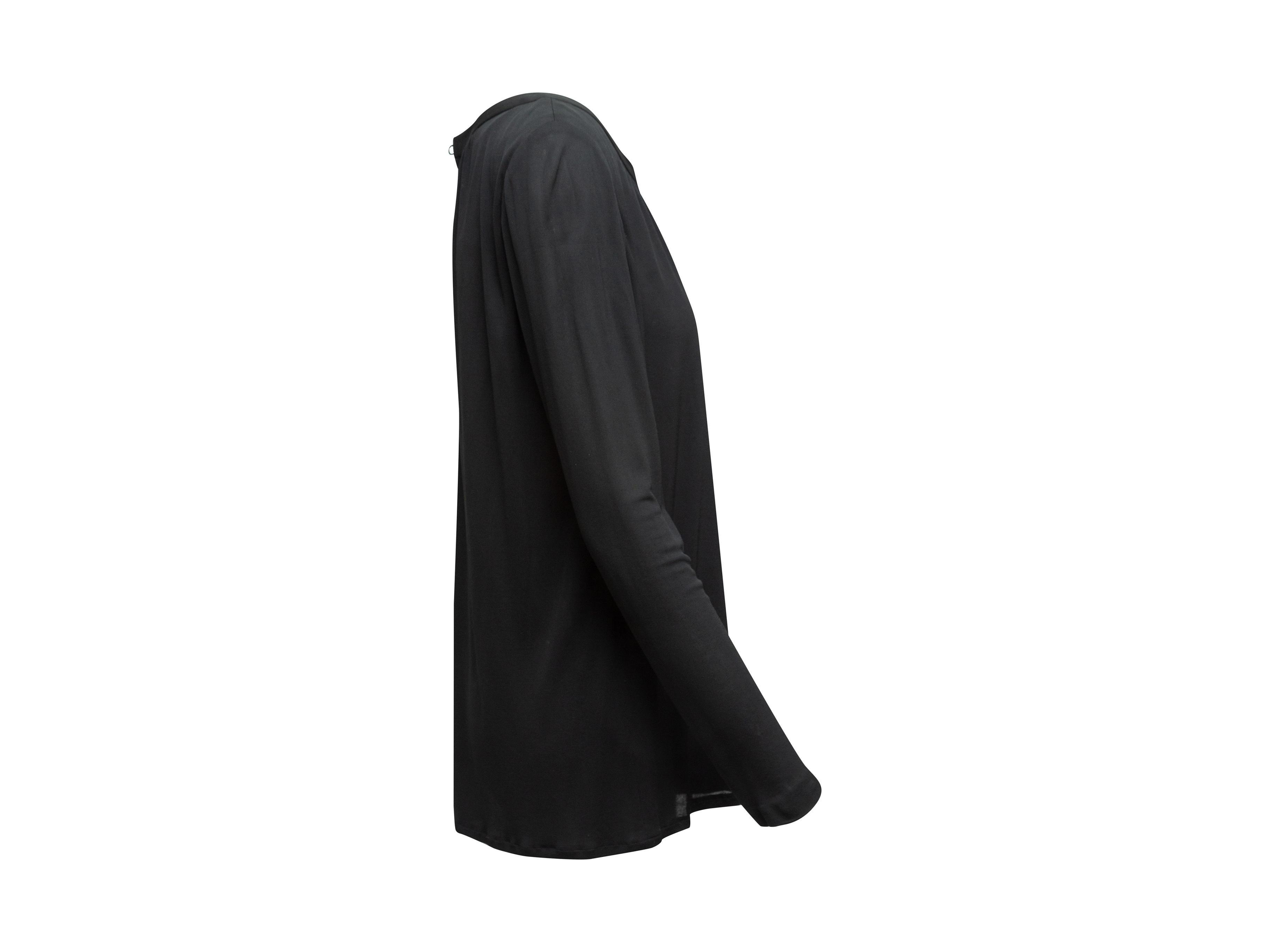 Product details: Vintage black long sleeve top by Yves Saint Laurent. Crew neck. Keyhole closure at nape. Designer size 42. 29