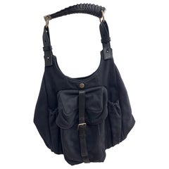 Yves Saint Laurent Black mombasa Sculptural Horn Handle & Buckled Front Pocket
